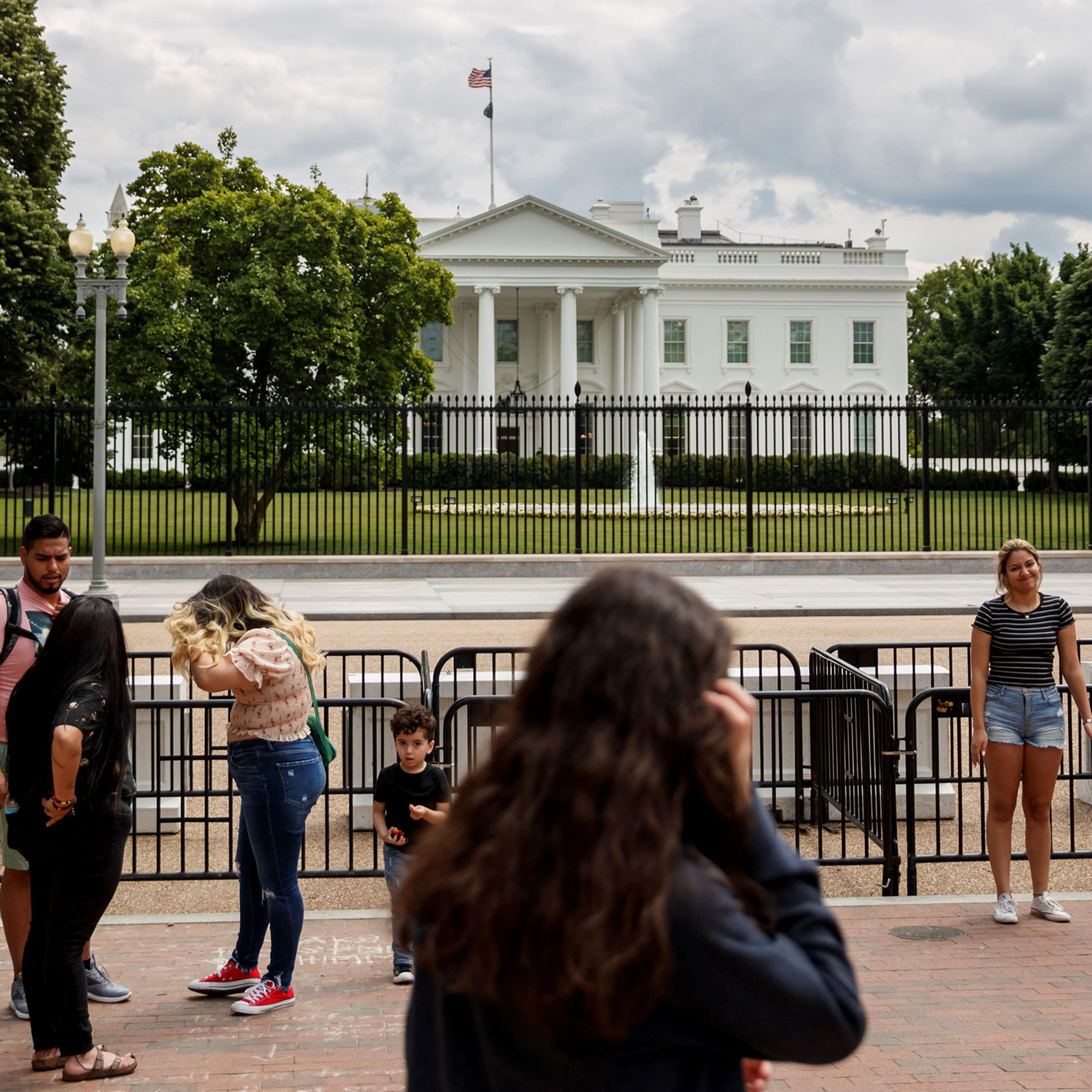 People are seen near the White House in Washington, on May 17, 2021.