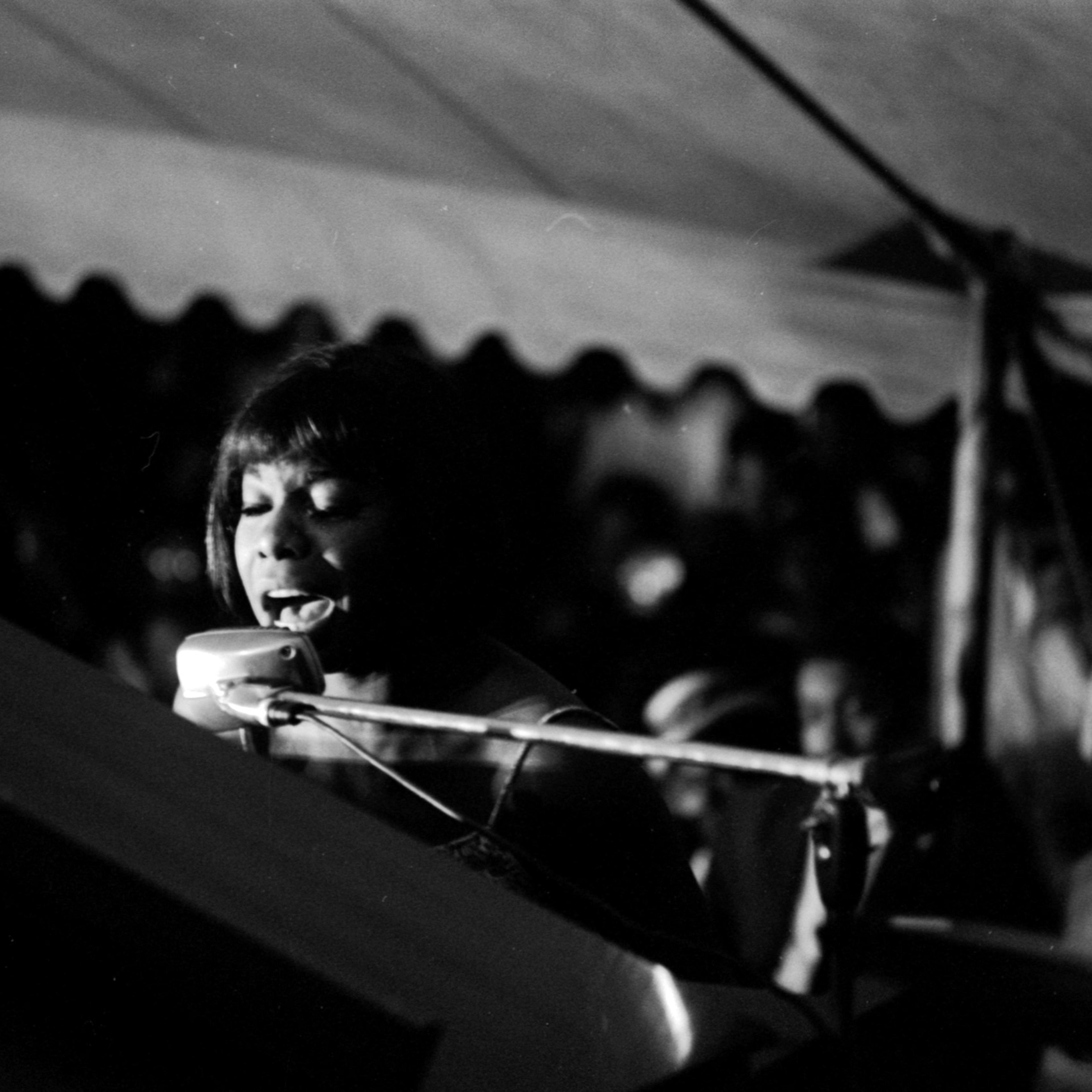 Nina Simone performs at the Salute to Freedom benefit concert. August 5, 1963.