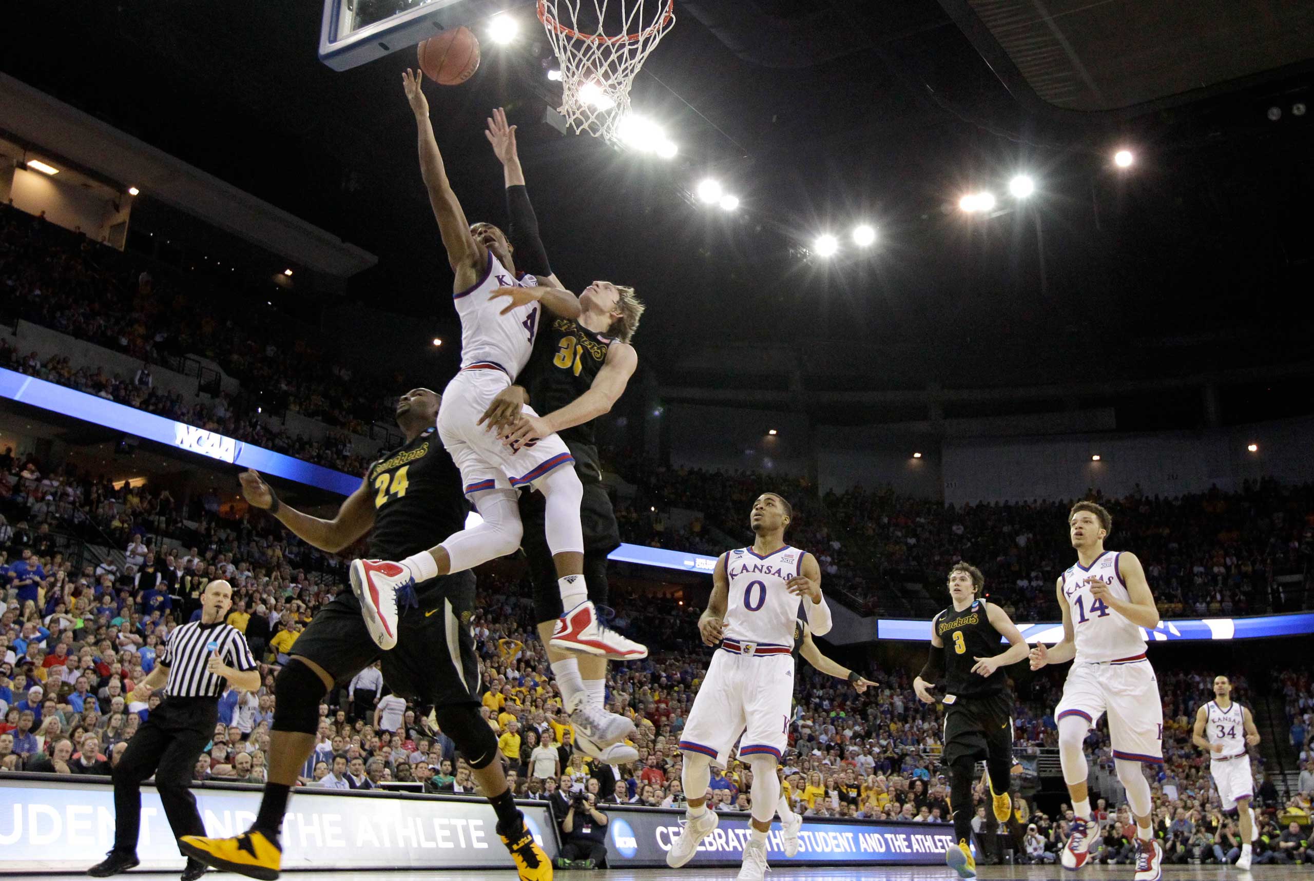 Devonte Graham, Shaquille Morris, Ron Baker