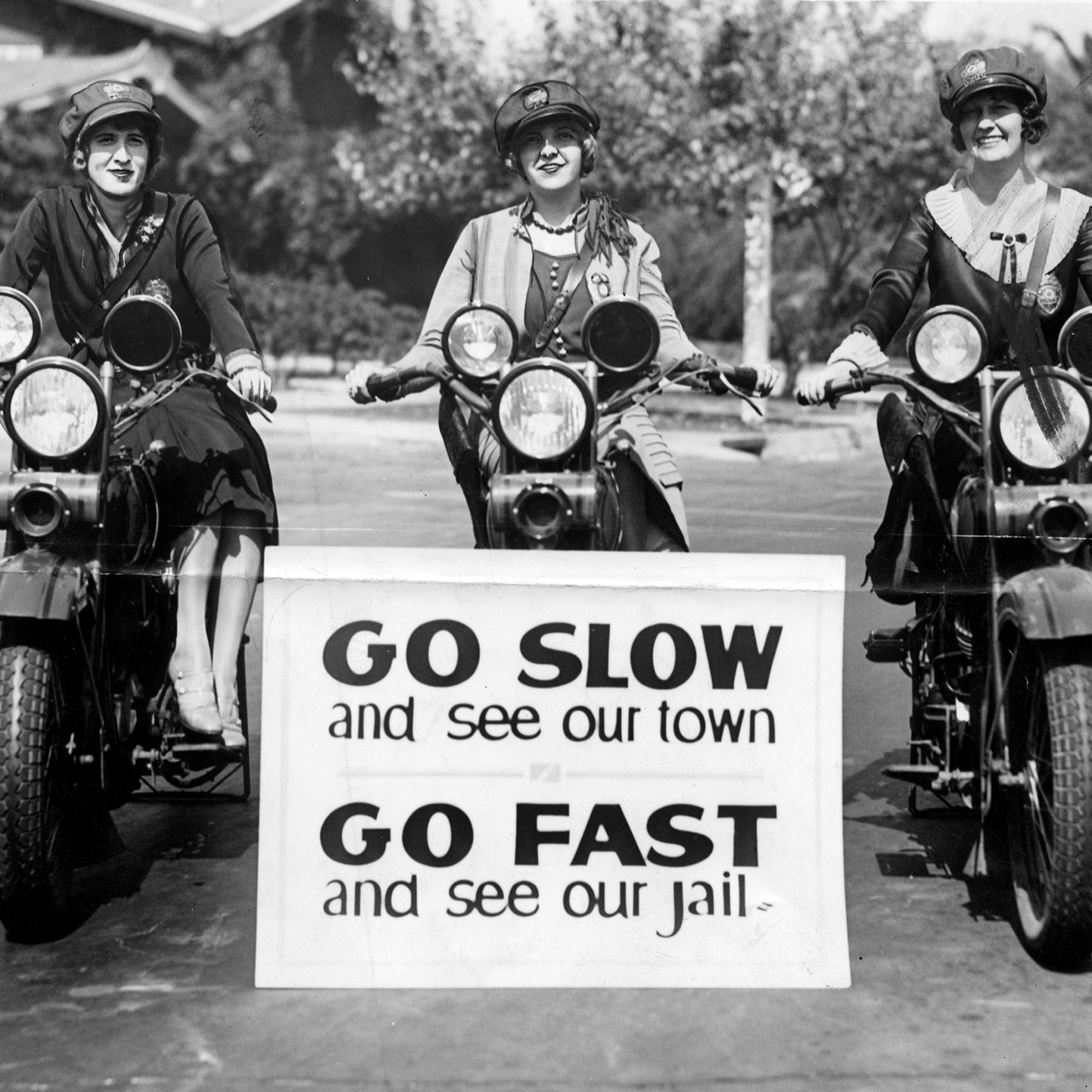Three motorcycle officers with the LAPD are on duty in 1927. From left to right: Miss Hildur Fleming; Miss Myra Richardson,; and Miss Beryl Wilson.