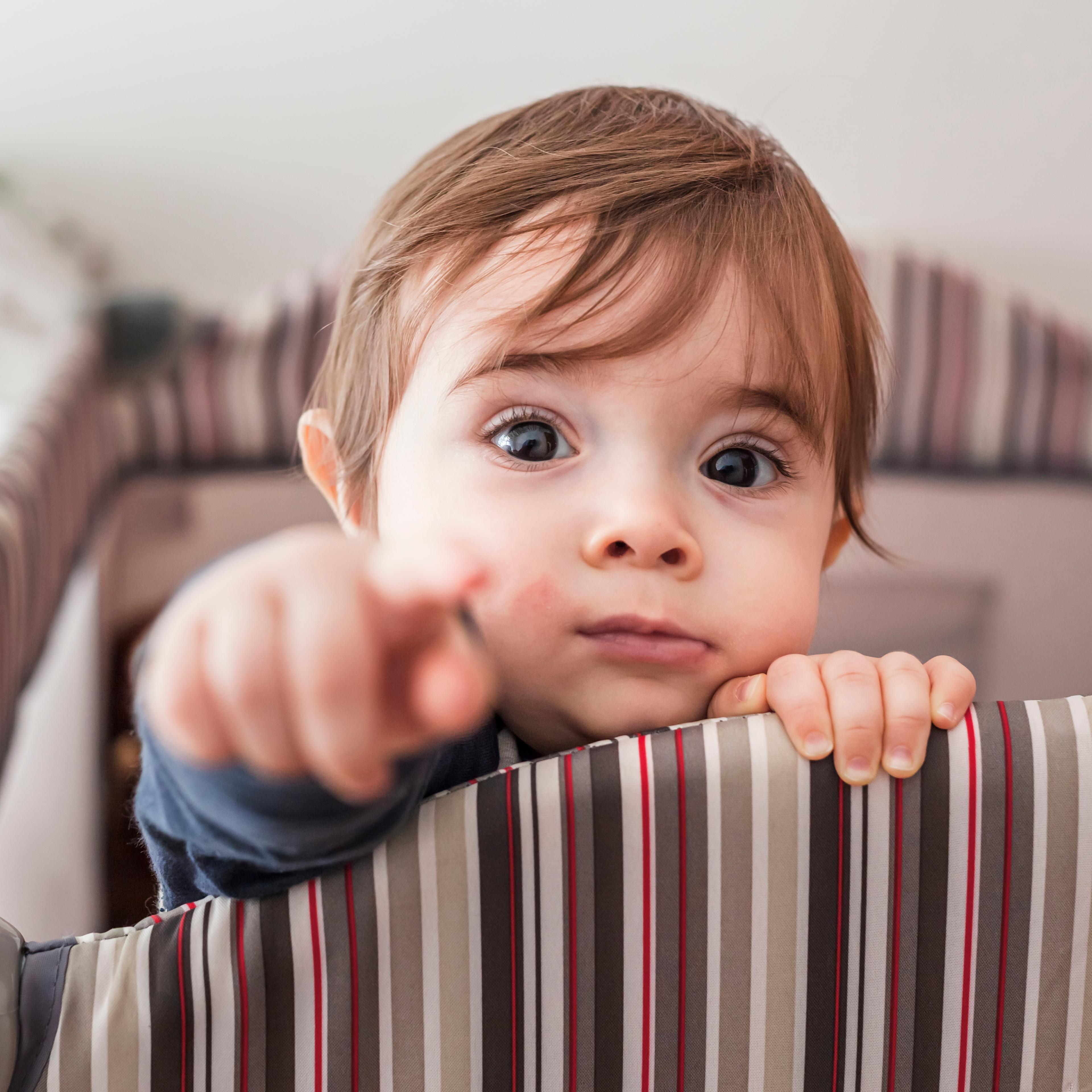 Baby pointing to the camera