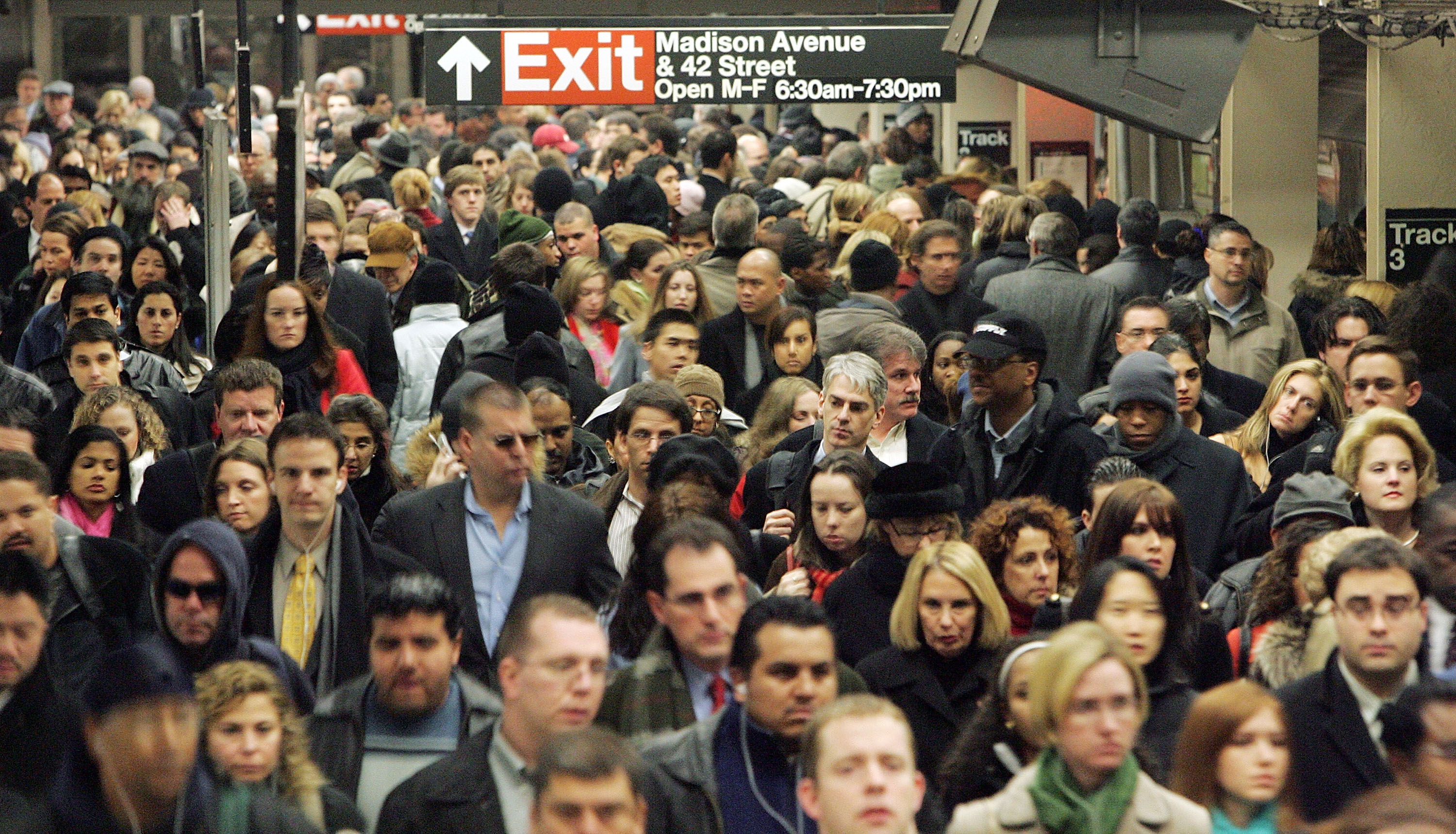 Commuters pass through Grand Central Terminal during morning rush hour December 19, 2005 in New York City.