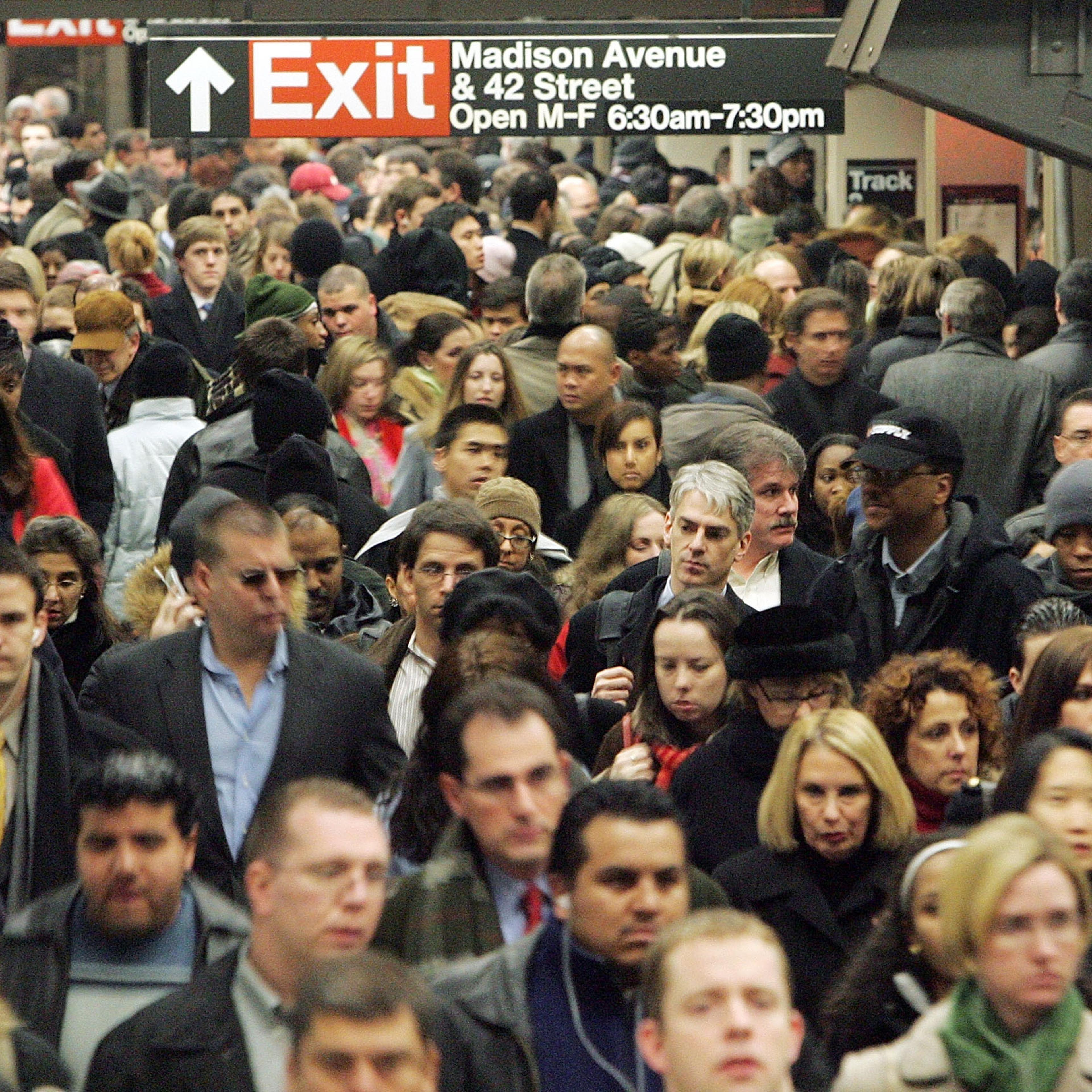 Commuters pass through Grand Central Terminal during morning rush hour December 19, 2005 in New York City.