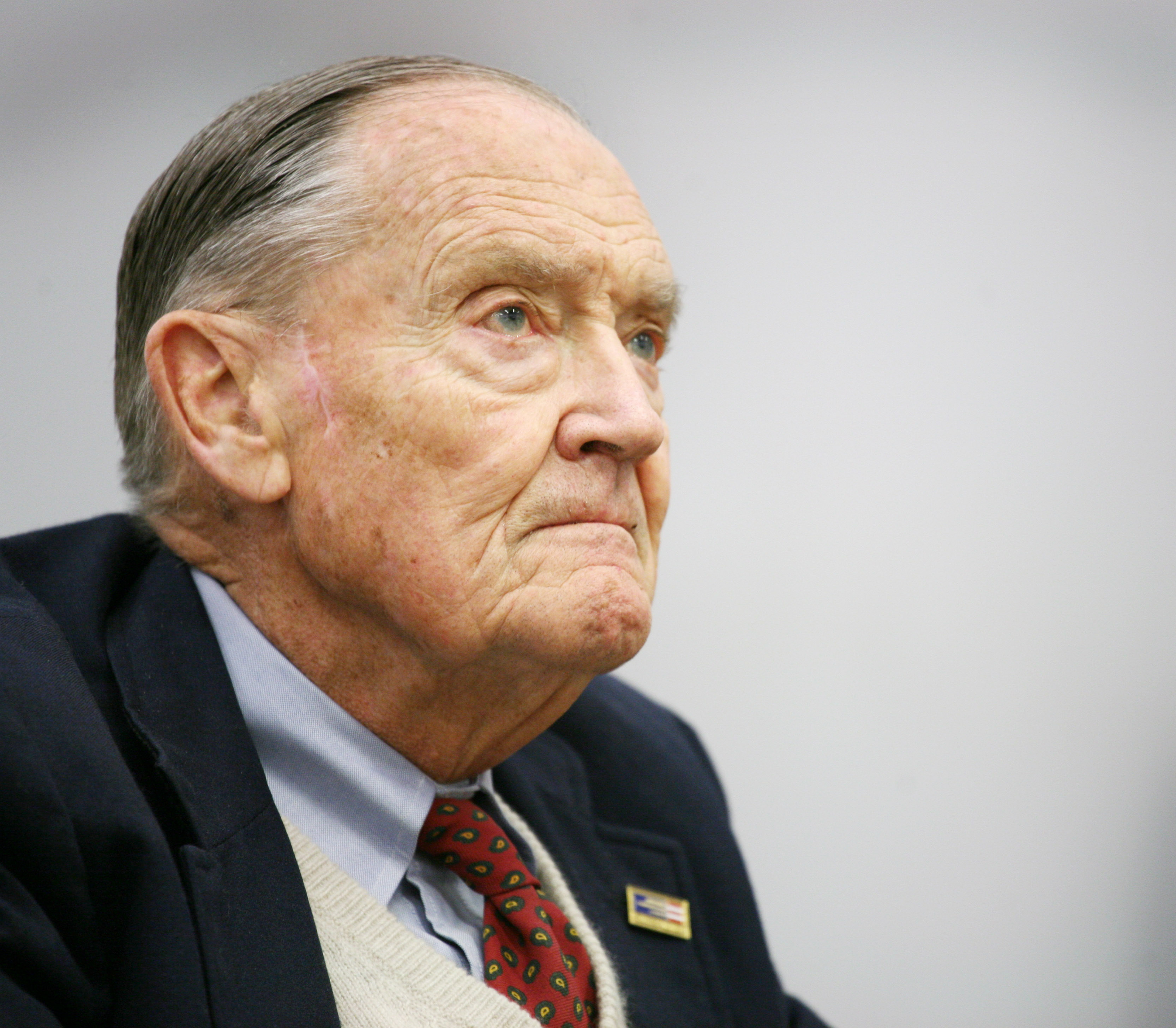 John Bogle listens during an interview