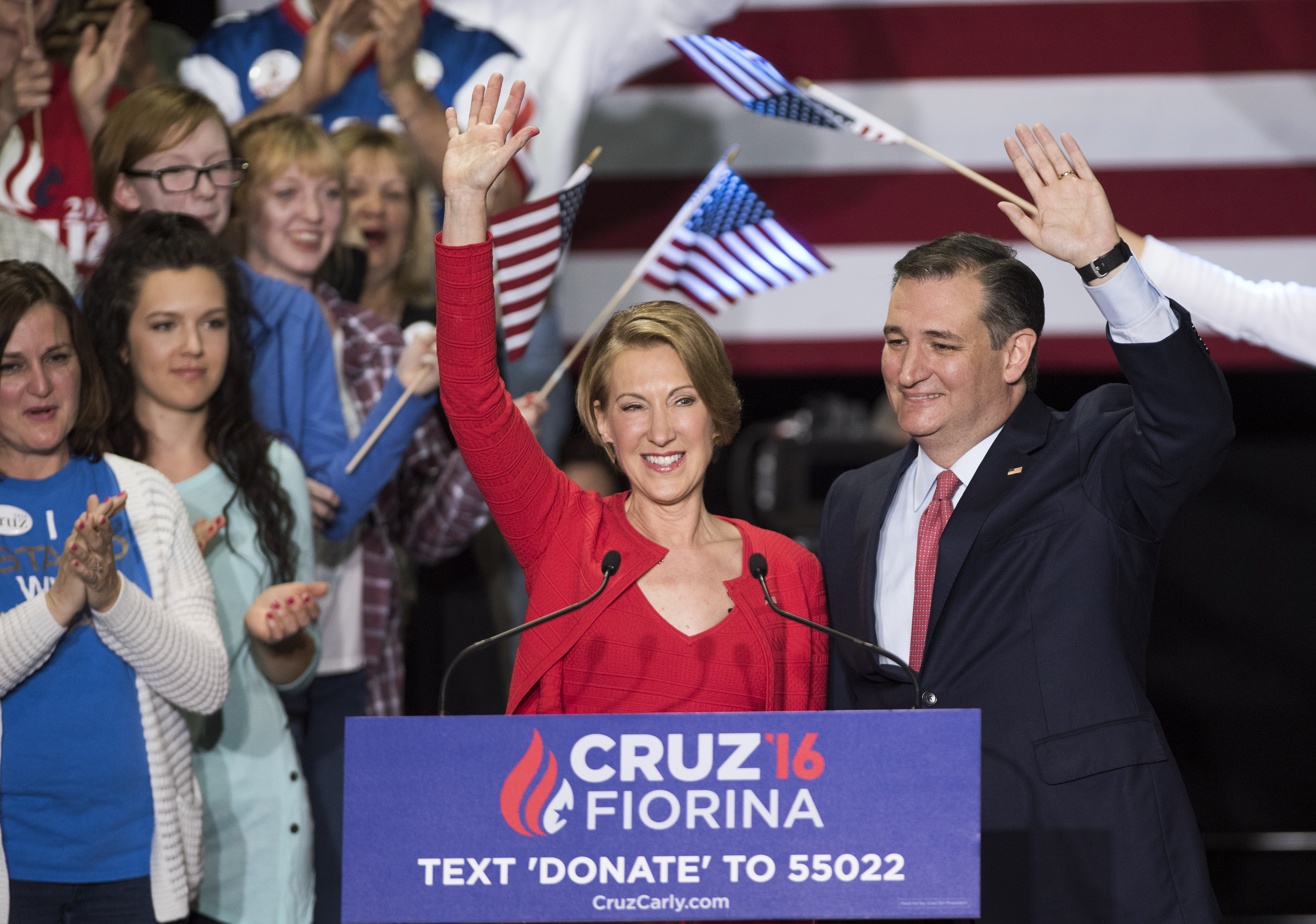 Republican presidential candidate Sen. Ted Cruz (R-TX) (R) greets supporters with former Hewlett-Packard chief executive Carly Fiorina at a campaign rally in the Pavilion at the Pan Am Plaza in Indianapolis on April 27, 2016.
