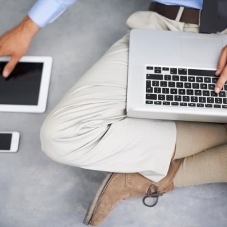 man-using-laptop-tablet-smartphone