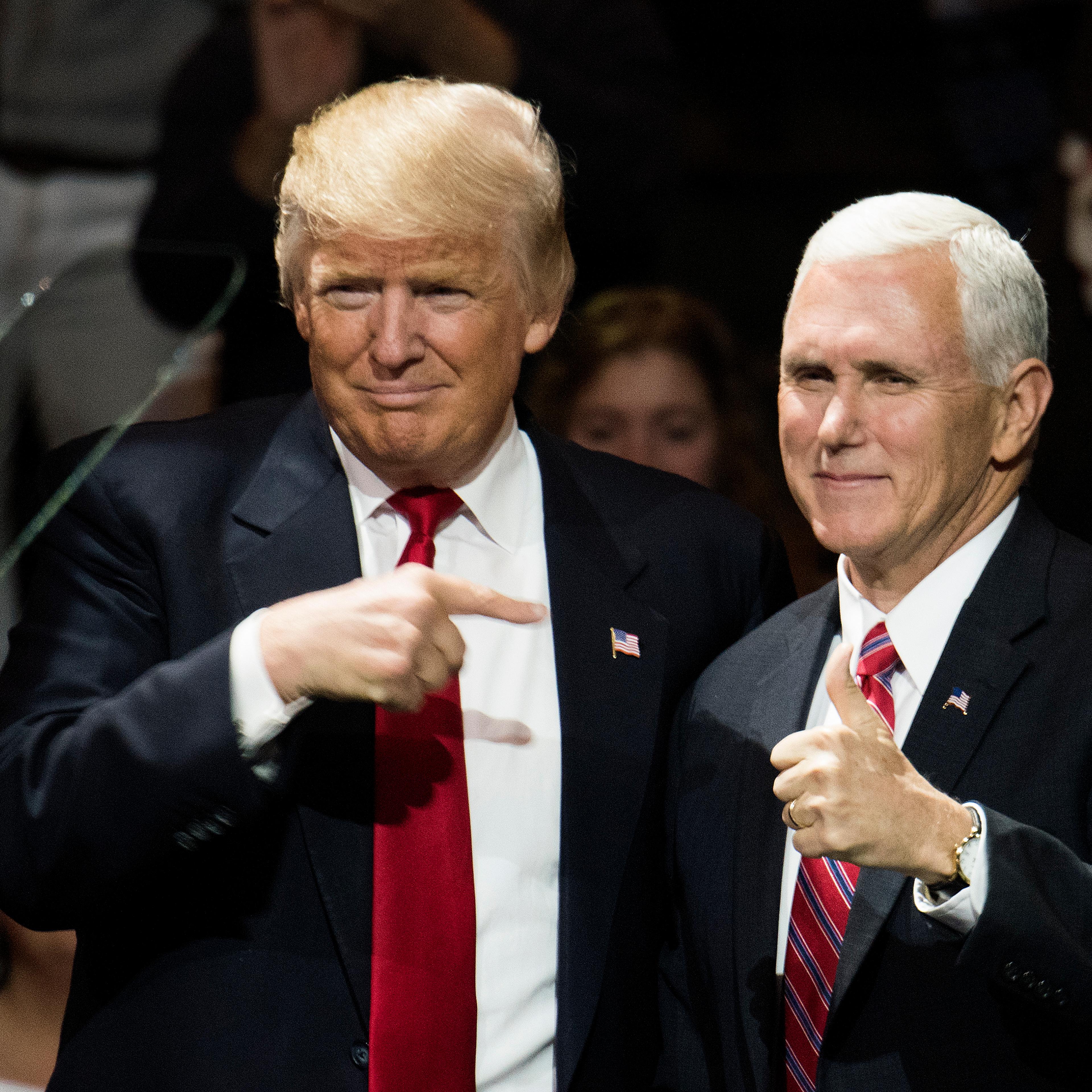 President-elect Donald Trump and Vice President-elect Mike Pence stand onstage together at U.S. Bank Arena in Cincinnati on Dec. 1, 2016.