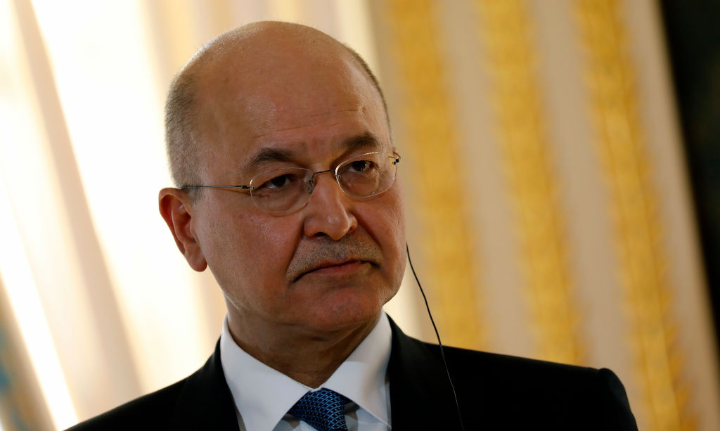 Iraqi President Barham Salih talks at a press conference