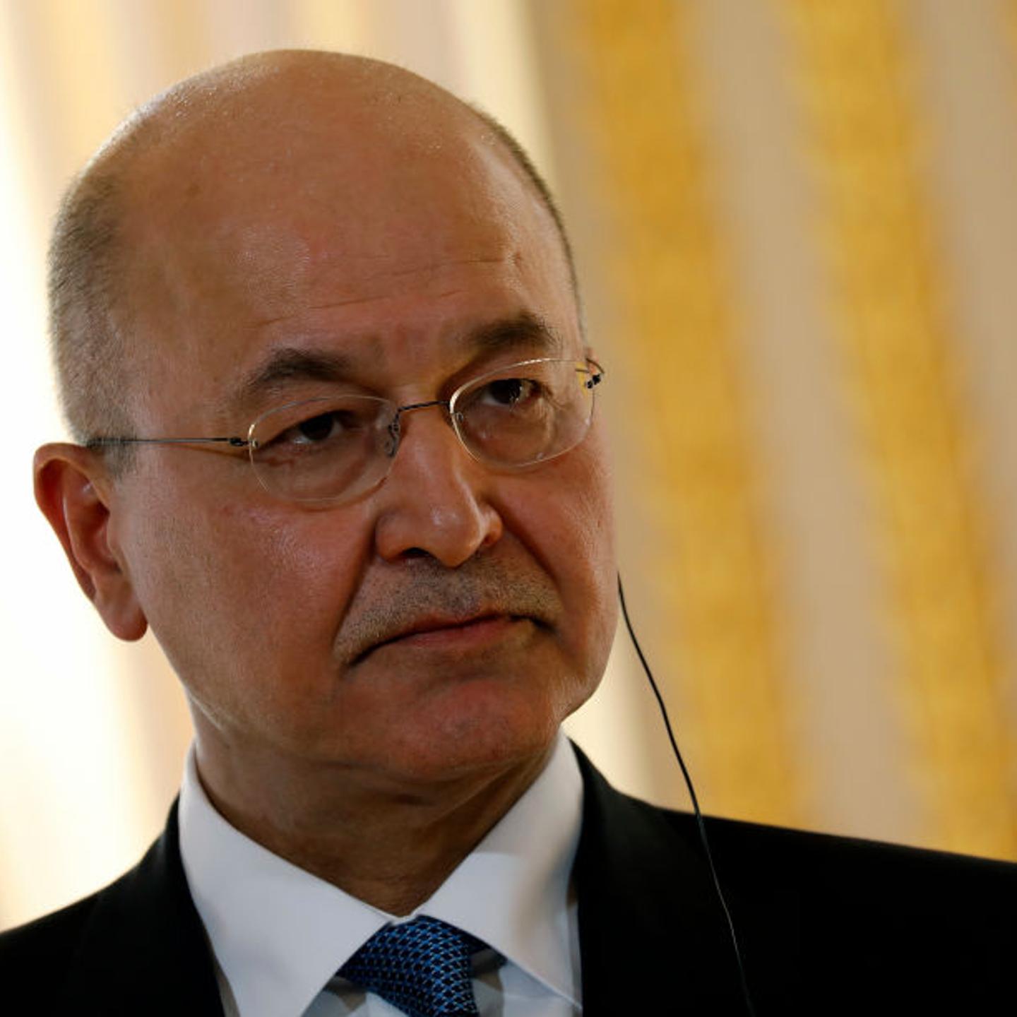 Iraqi President Barham Salih talks at a press conference