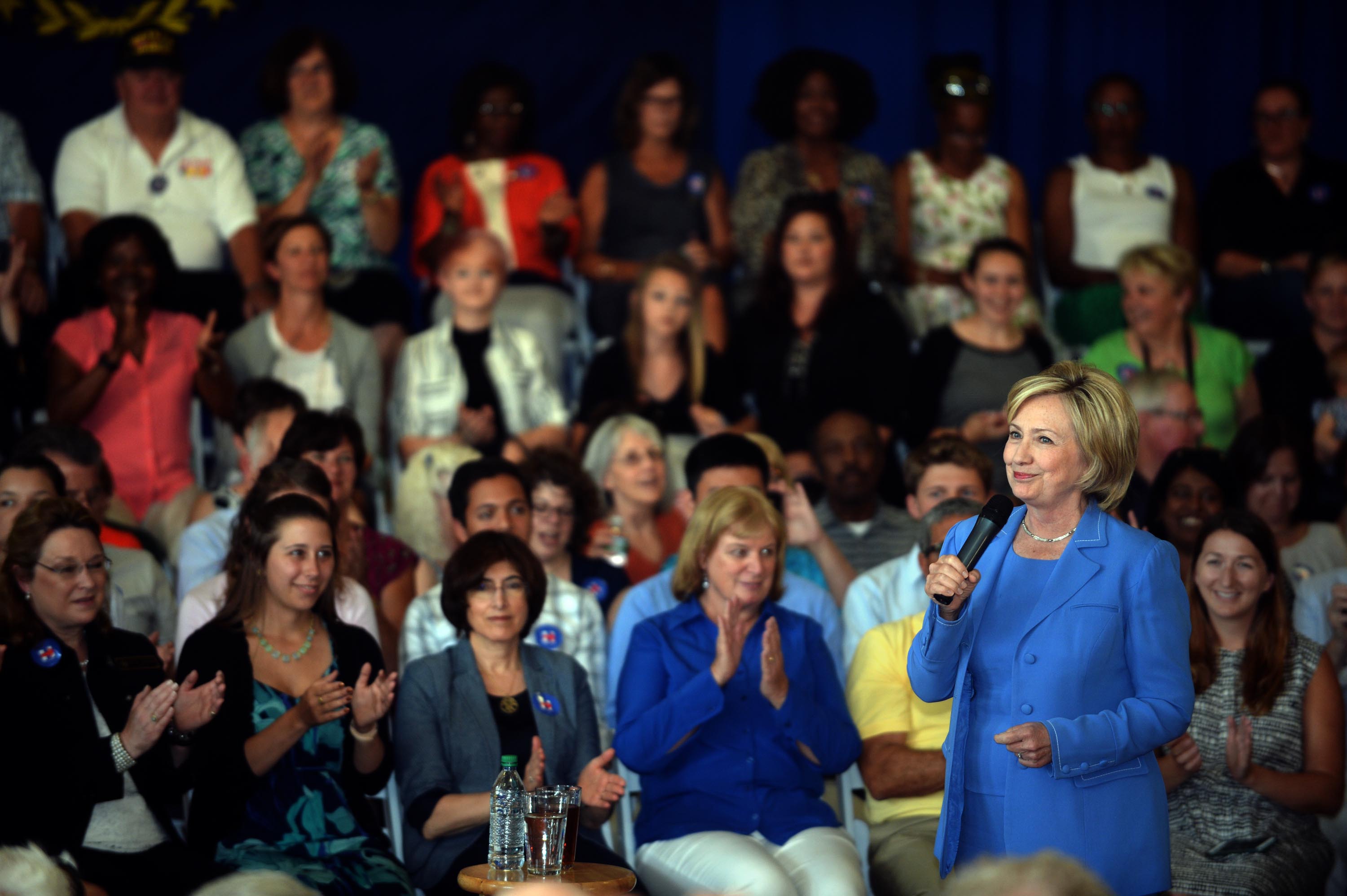 DOVER, NH - JULY 16: Democratic Presidential candidate Hillary Clinton speaks during a town hall event at Dover City Hall July 16, 2015 in Dover, New Hampshire. Clinton spoke about how to build an economy that will boost the middle class. (Photo by Darre