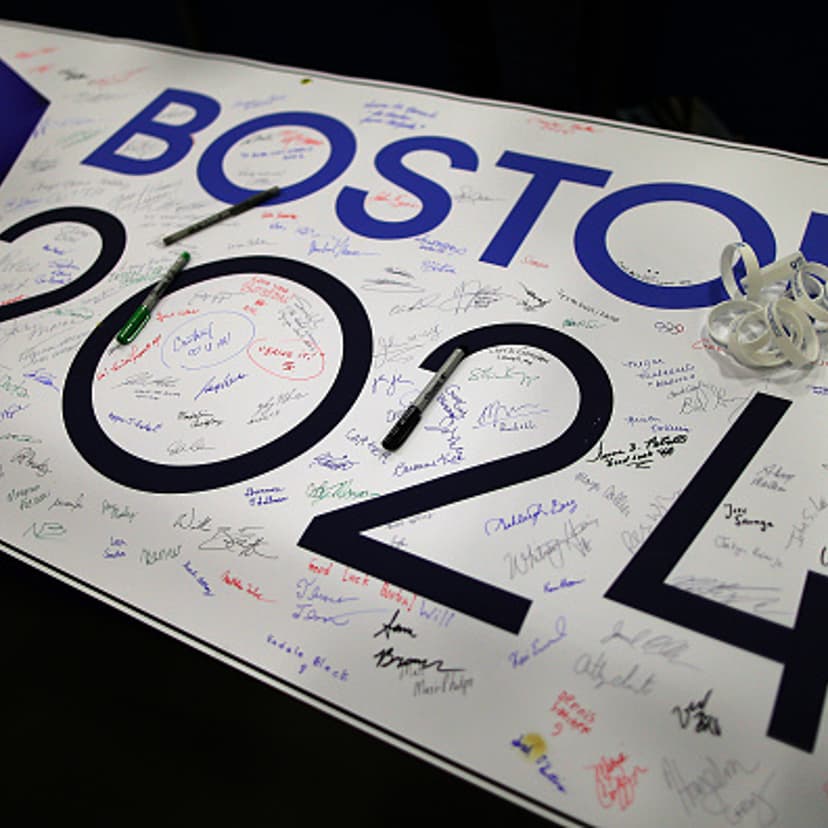 Signatures of support for Boston 2024 cover a banner on the table at a grassroots campaign in Boston on March 14, 2015.