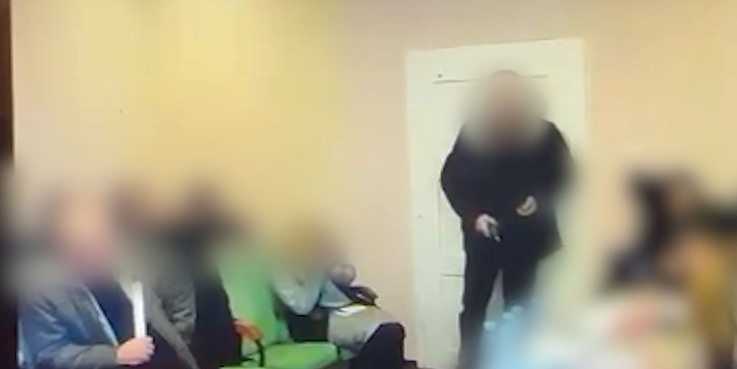 A video screen grab from an incident in Keretsky, Zakarpattia, Ukraine. At least 26 people were injured, six of them critically after a deputy councillor detonated three grenades during a council meeting, Ukrainian police report, on Dec. 15, 2023.