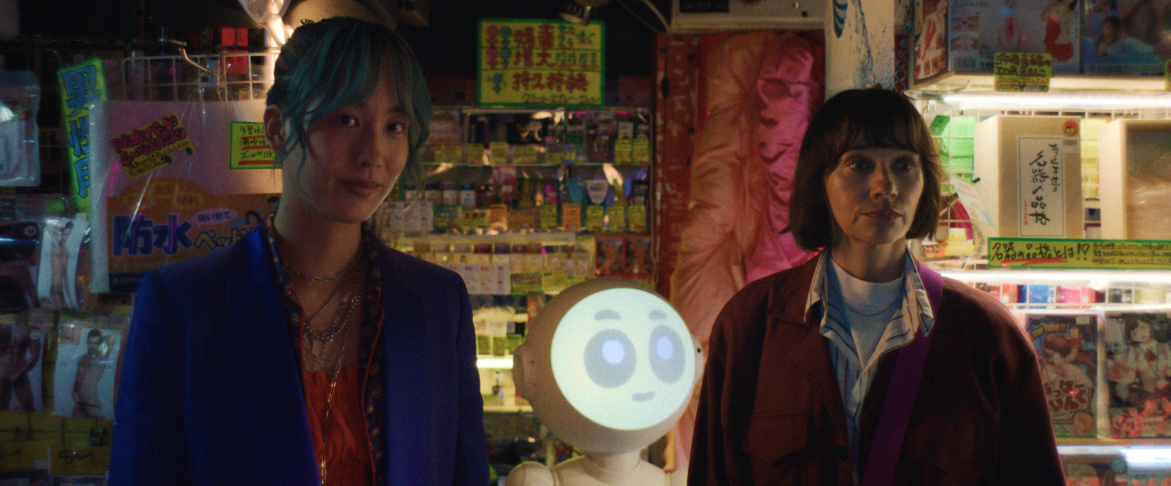 annie the clumsy, left, and Rashida Jones in <i>Sunny</i>