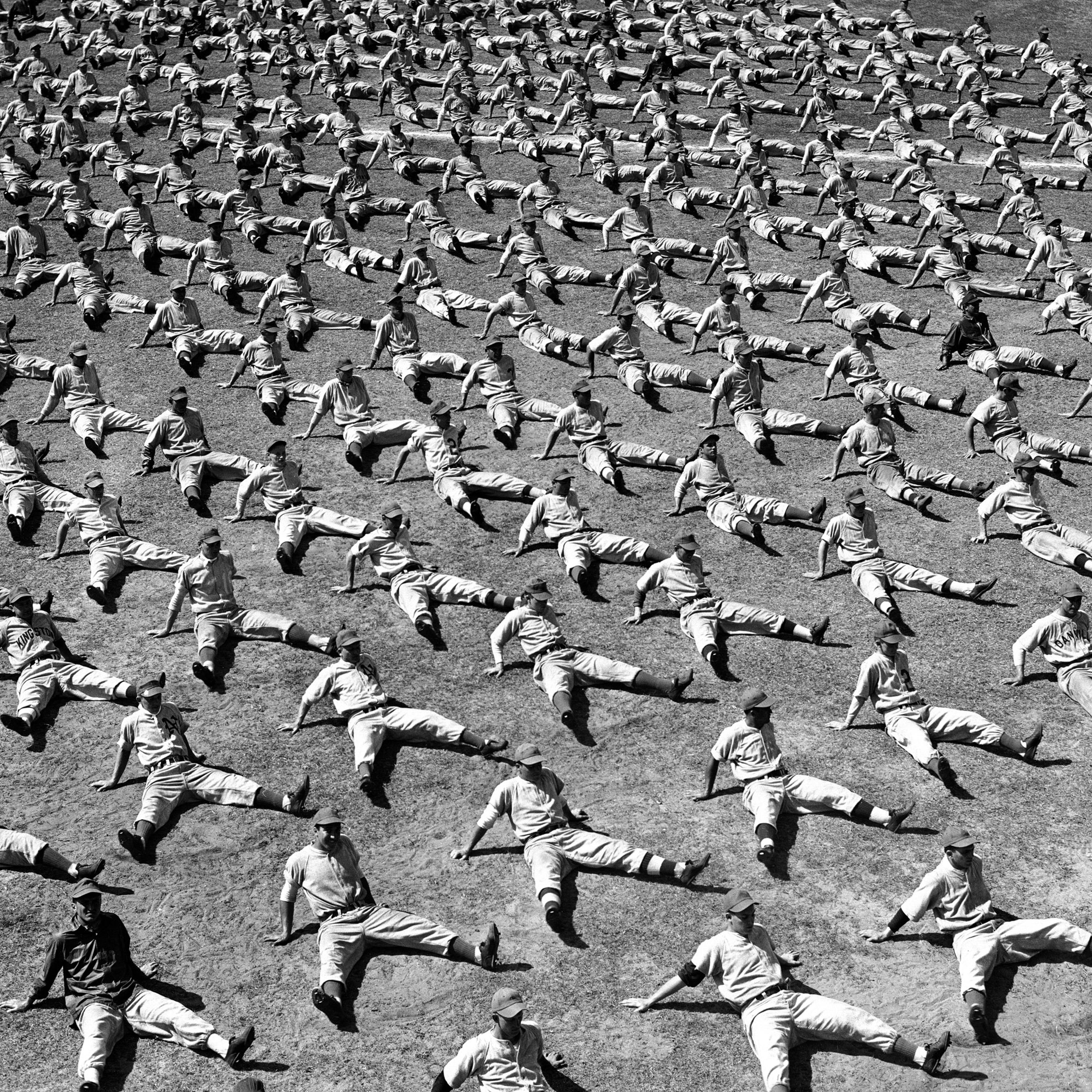 Brooklyn Dodger rookies and prospects do calisthenics as part of daily training routine, Vero Beach, Fla., 1948.