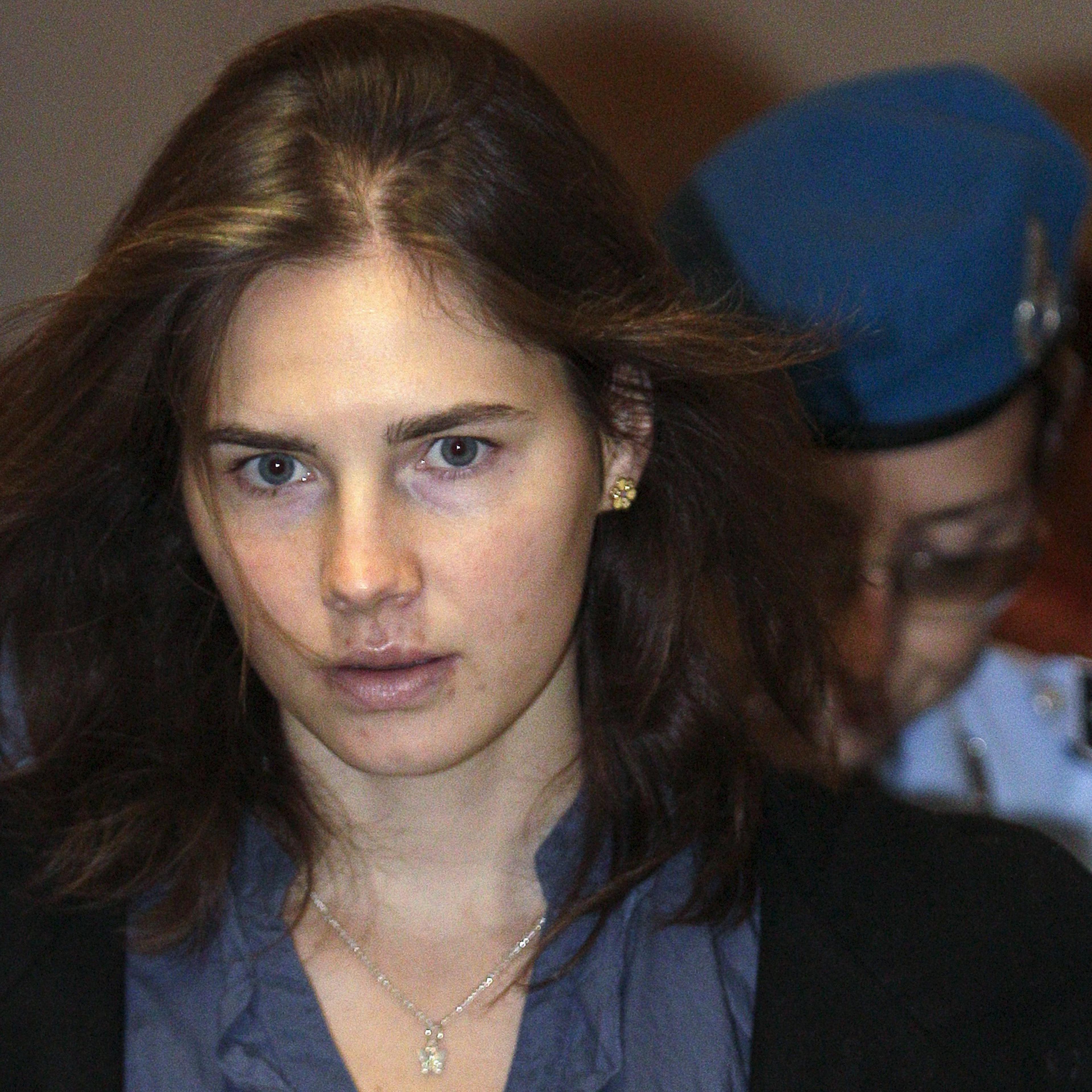 File photo of Knox, the U.S. student convicted of murdering her British flatmate in Italy in November 2007, arriving at the court during her appeal trial session in Perugia