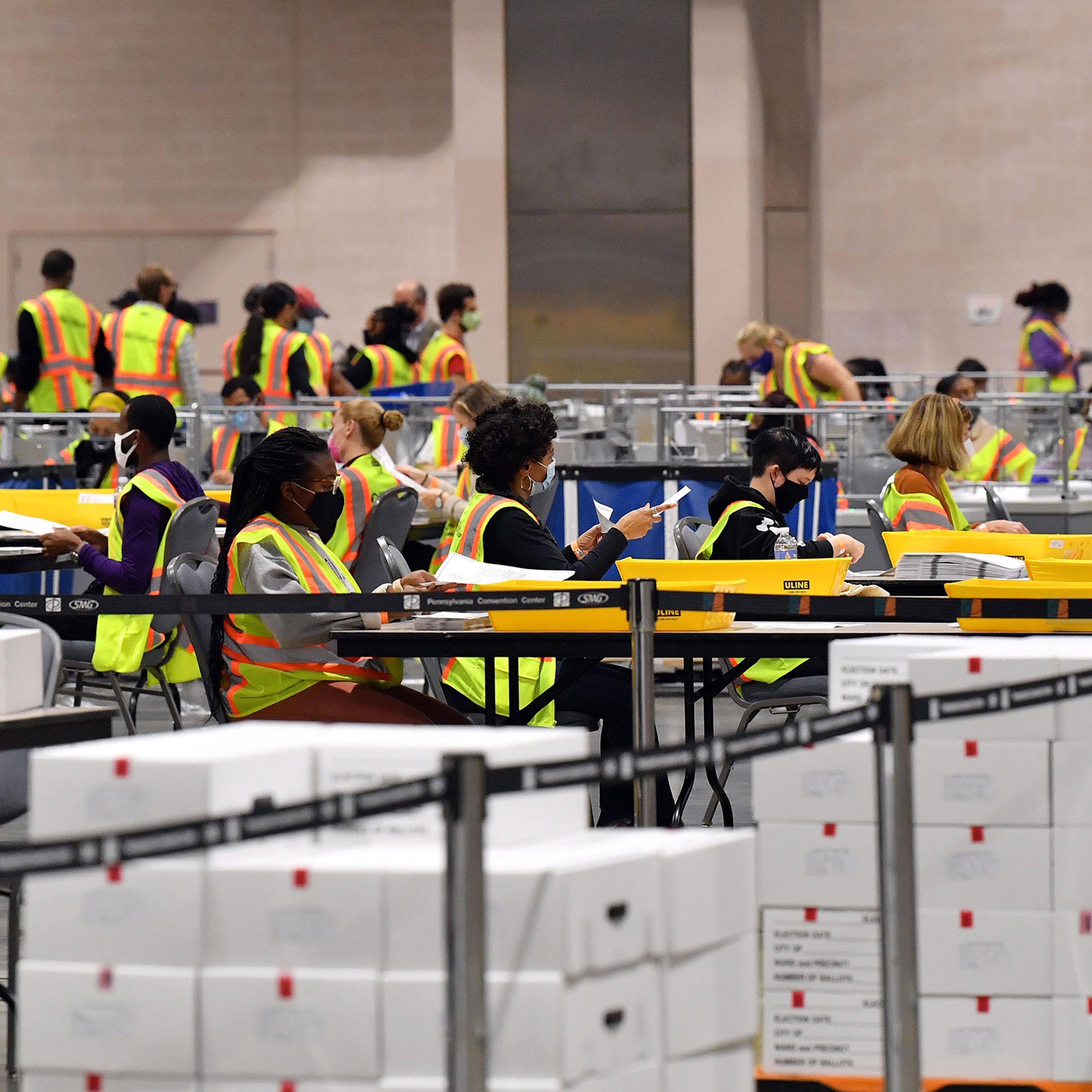 Philadelphia County employees open, sort and count mail-in ballots for the 2020 Presidential Election in Philadelphia, Penn. on Nov. 3, 2020.