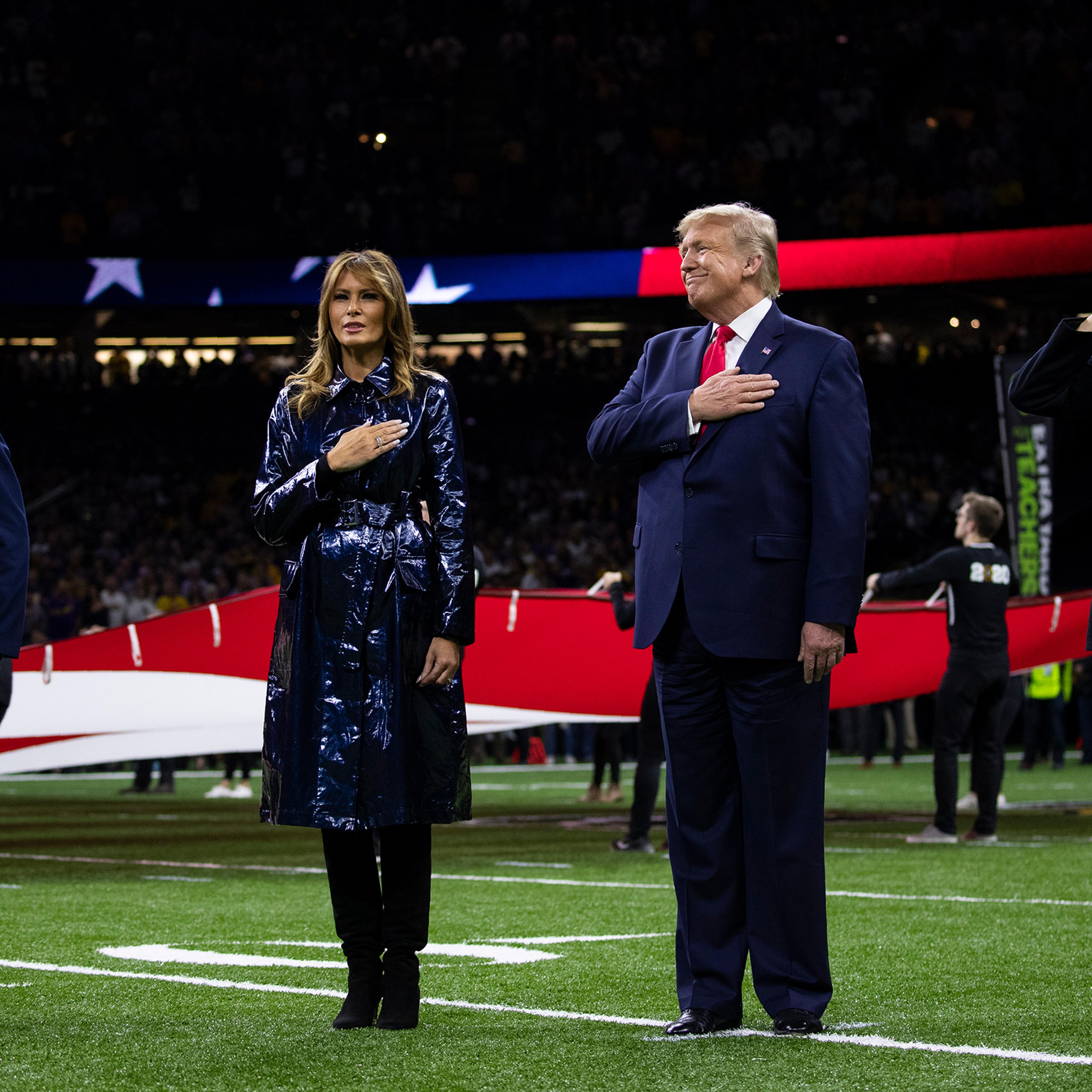 President Donald Trump and first lady Melania Trump stand for the national anthem before the beginning of the College Football Playoff National Championship game on Jan. 13 in New Orleans