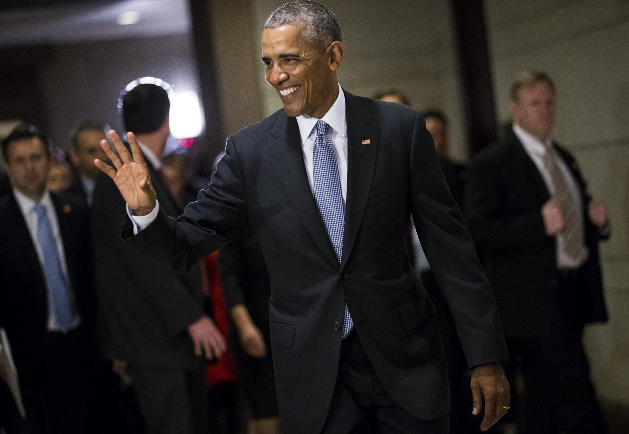 US President Obama leaves after meeting with Congressional Democrats