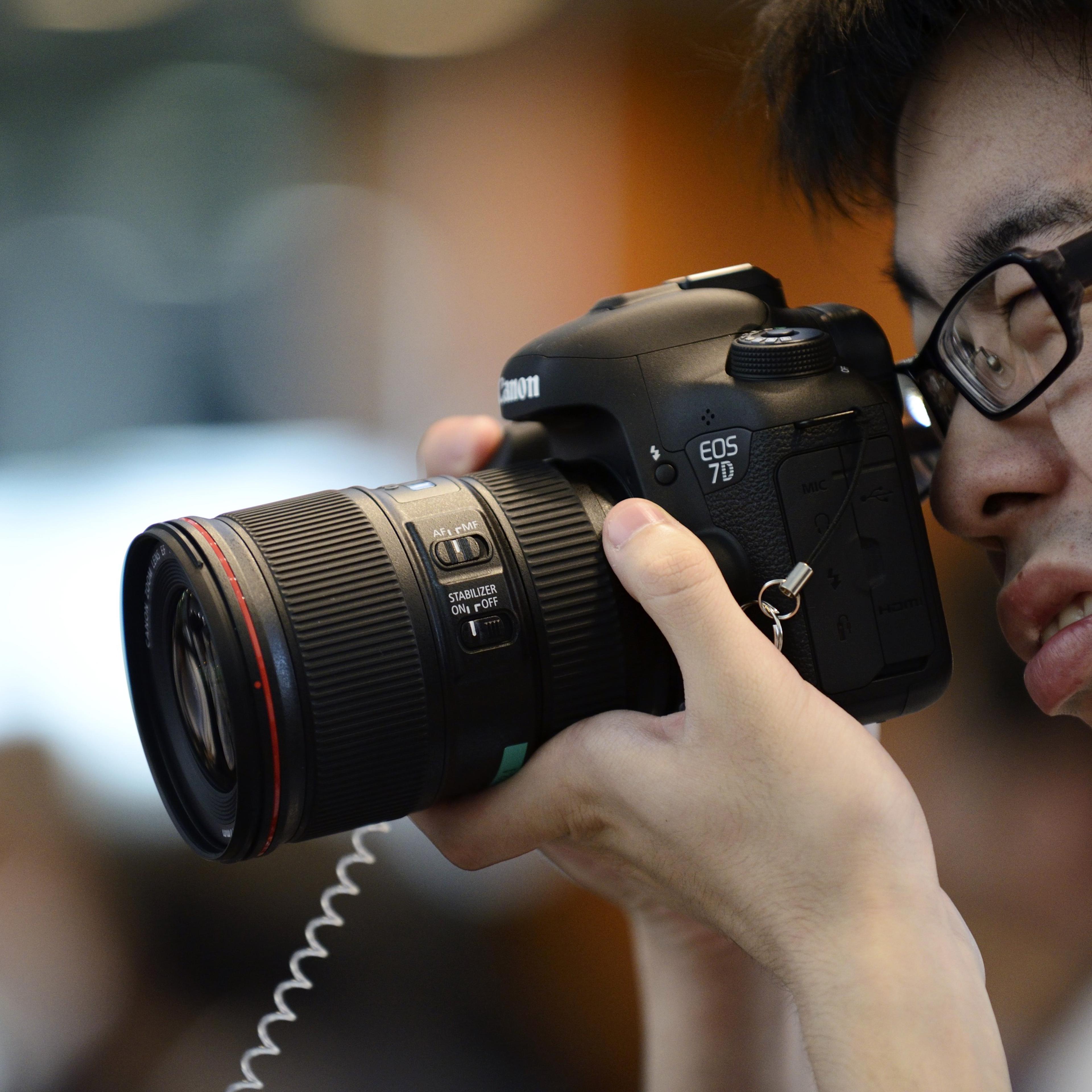 Canon Marketing Japan Inc. President Masami Kawasaki Unveils New Digital Cameras
