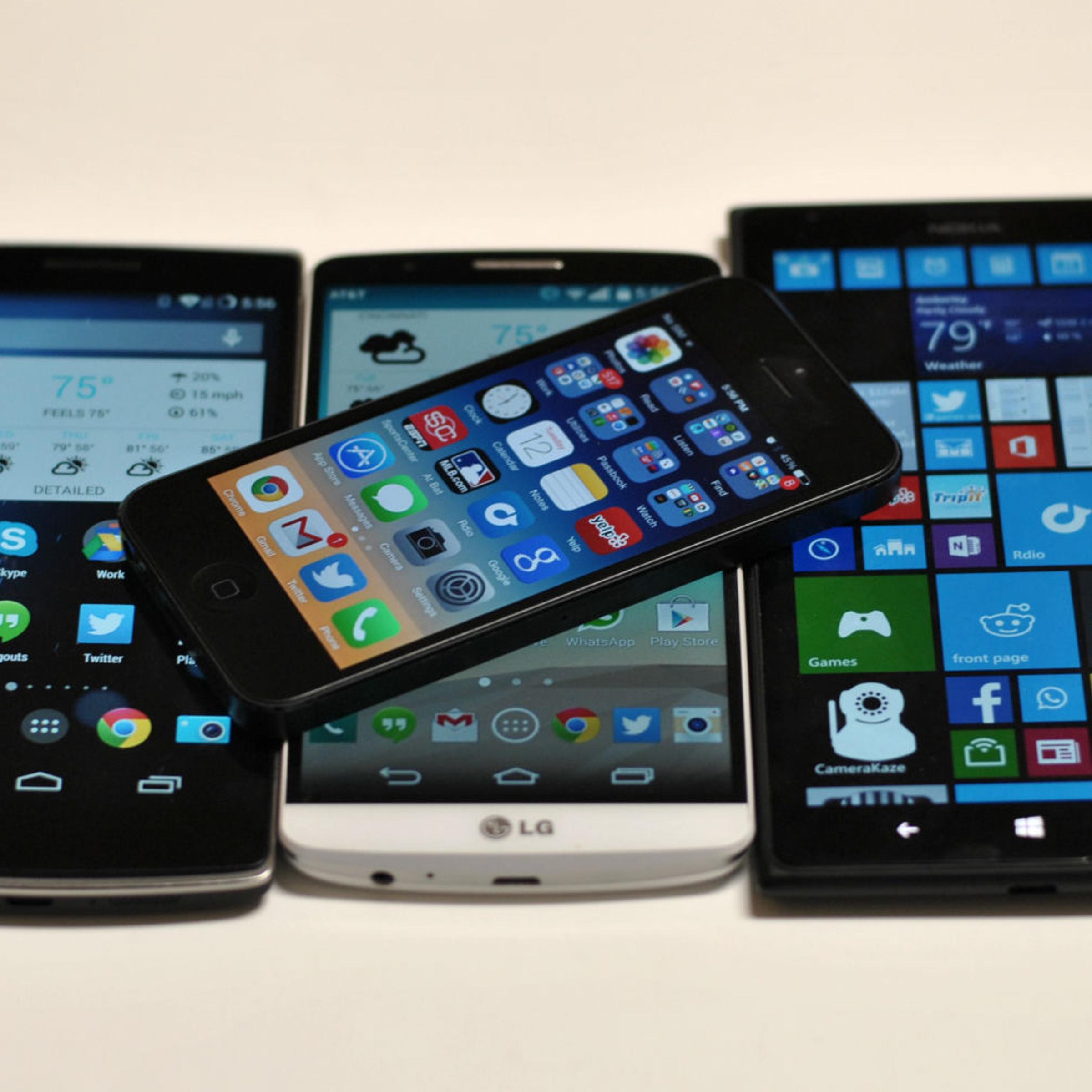 Left to right: OnePlus One, Apple iPhone (above), LG G3, Nokia Lumia 1520