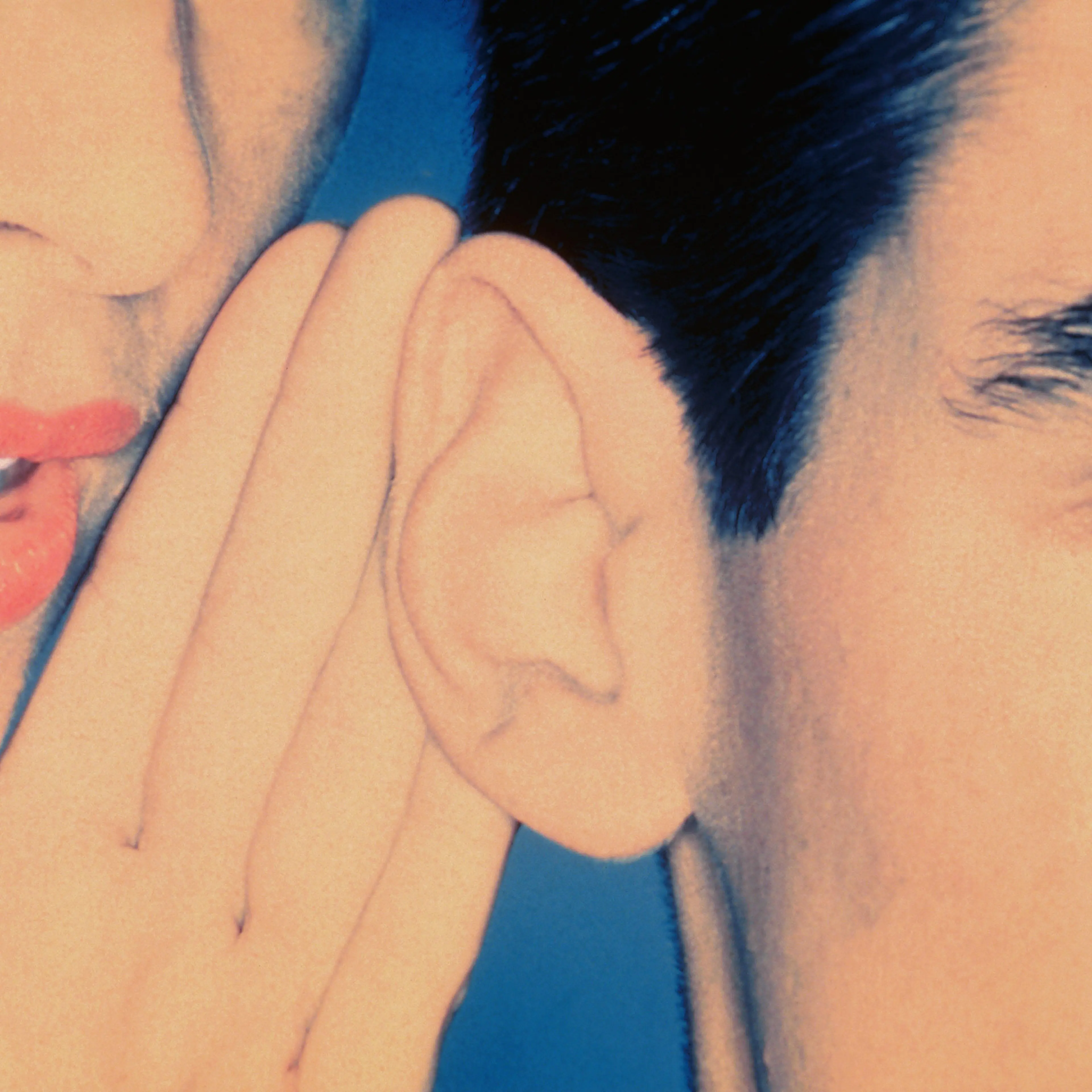 Man and woman gossiping