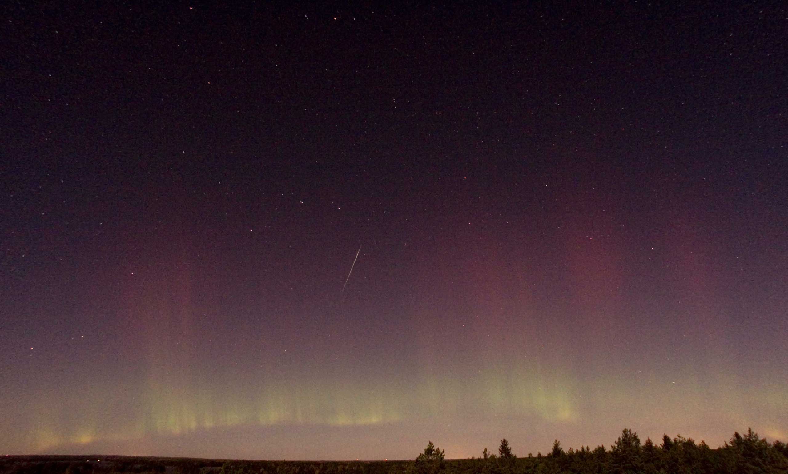 View of a shooting star (Draconid) and n