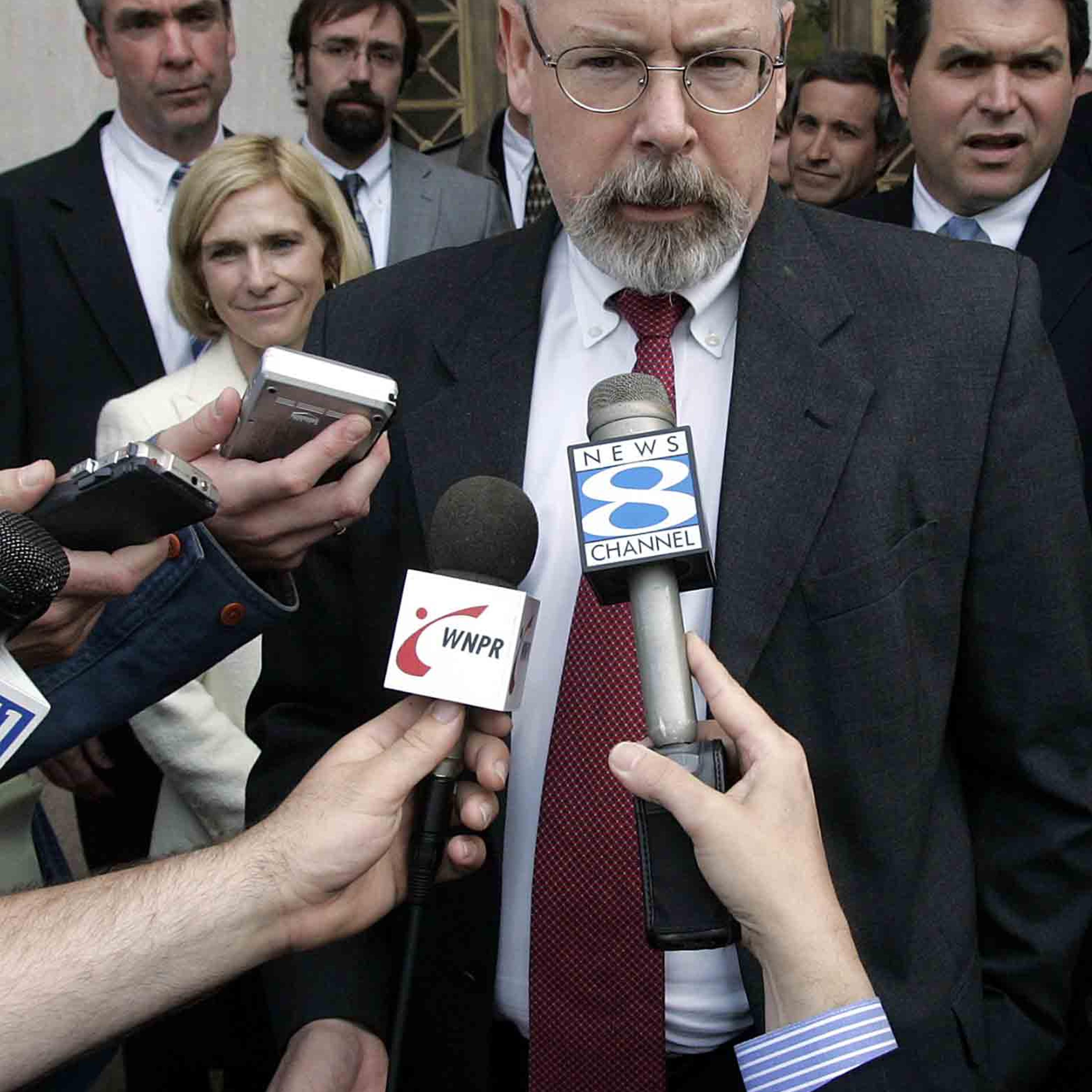 John Durham speaks to reporters outside of the U.S. District Court in New Haven, Conn. on April 25, 2006.