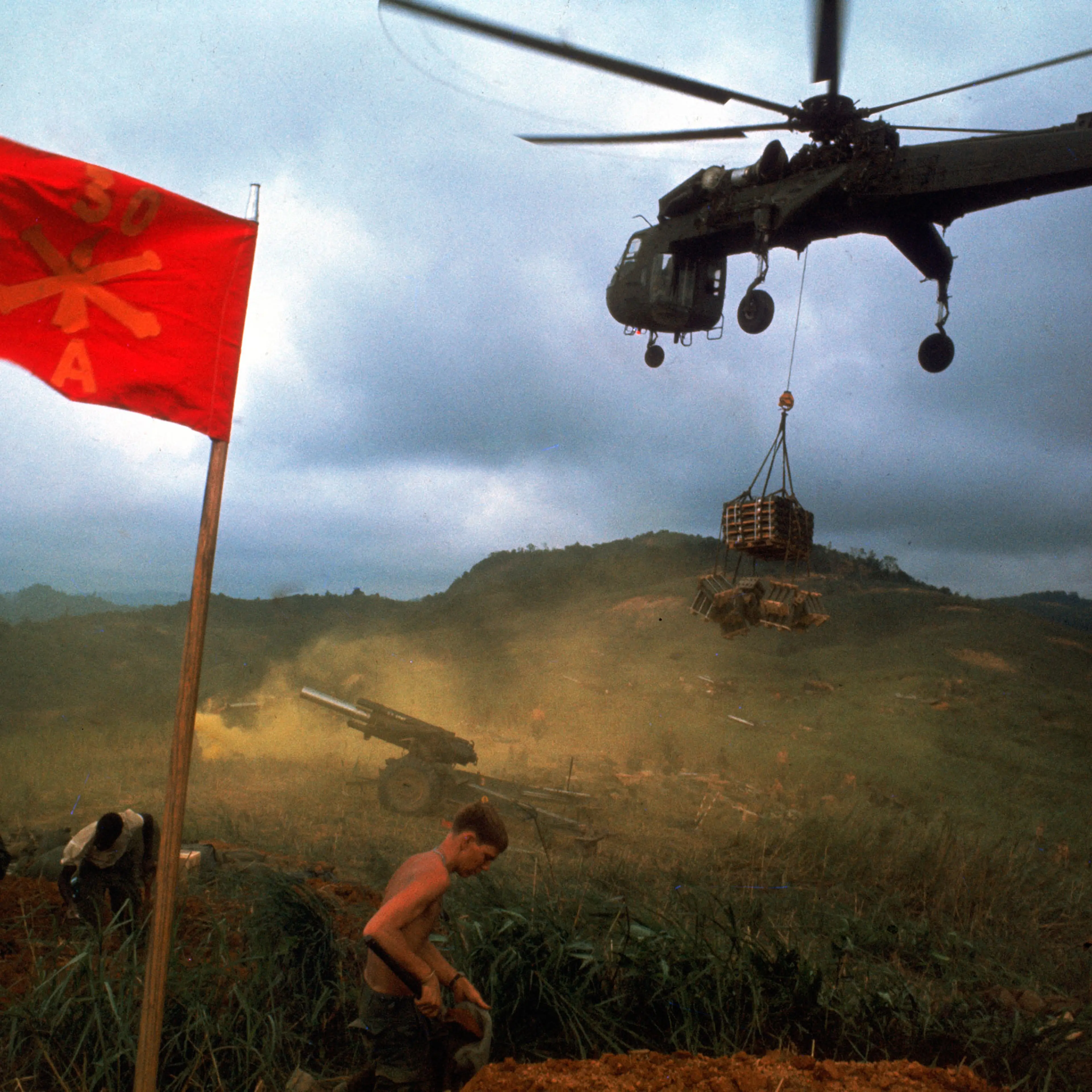 An American 1st Air Cavalry helicopter airlifts supplies into a Marine outpost during Operation Pegasus in Vietnam in 1968.
