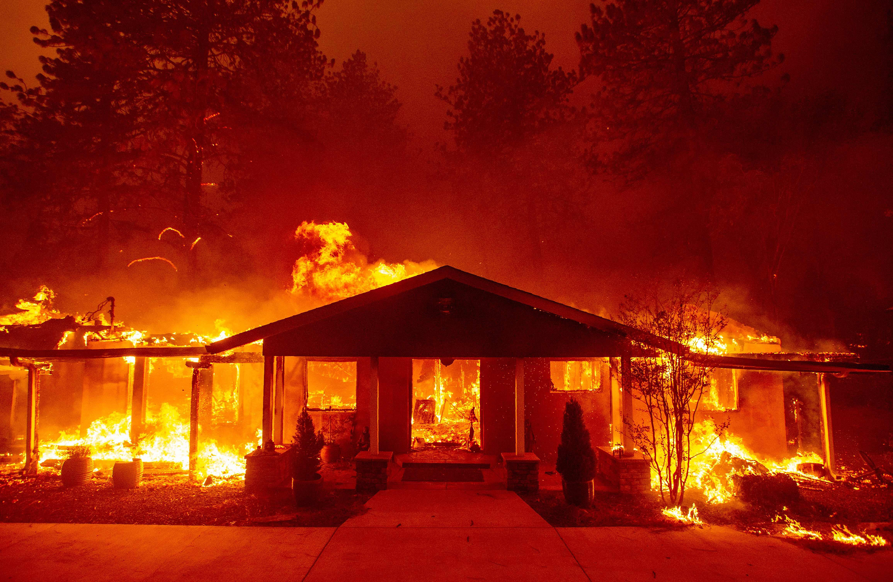 A home burns during the Camp fire in Paradise, Calif. on Nov. 8.