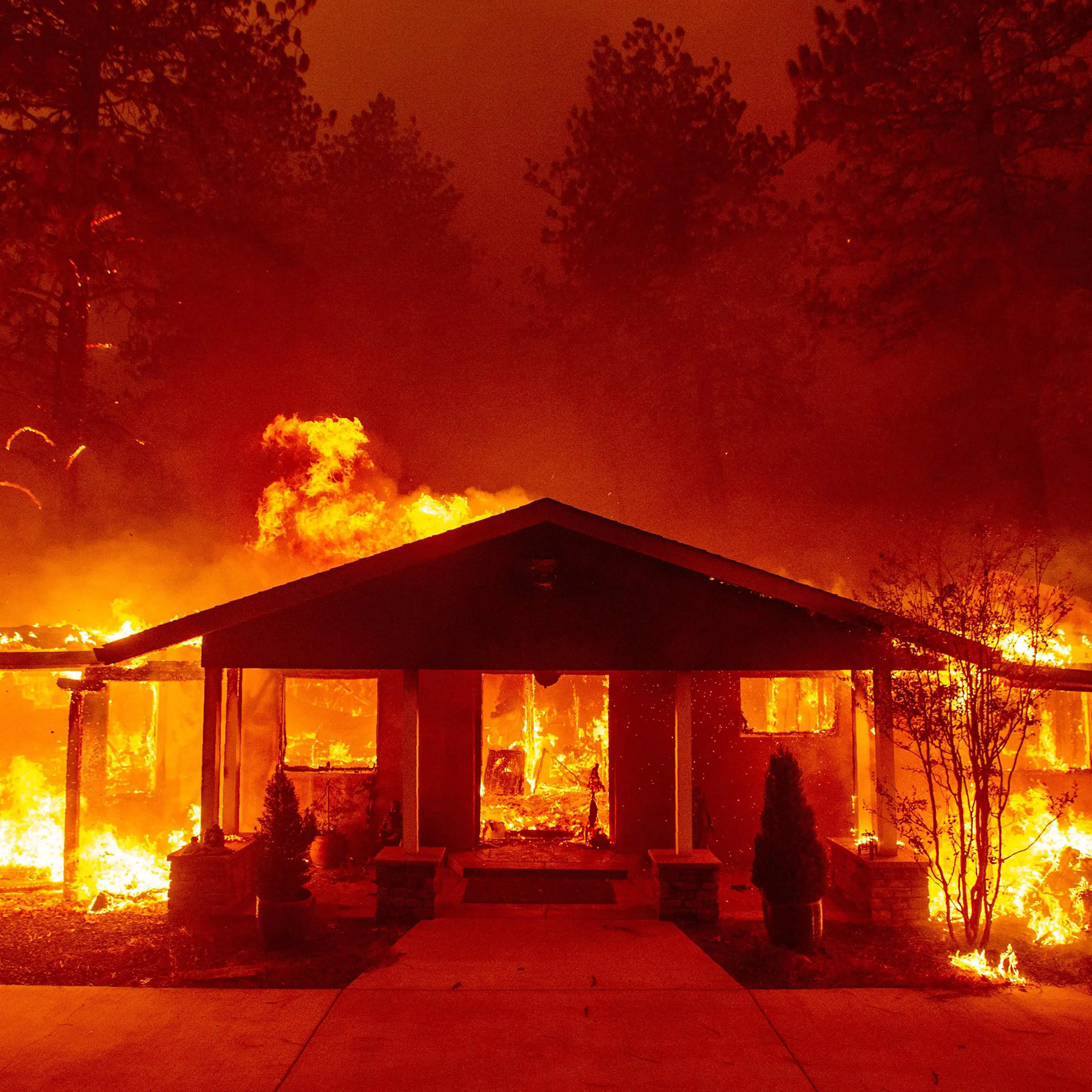 A home burns during the Camp fire in Paradise, Calif. on Nov. 8.