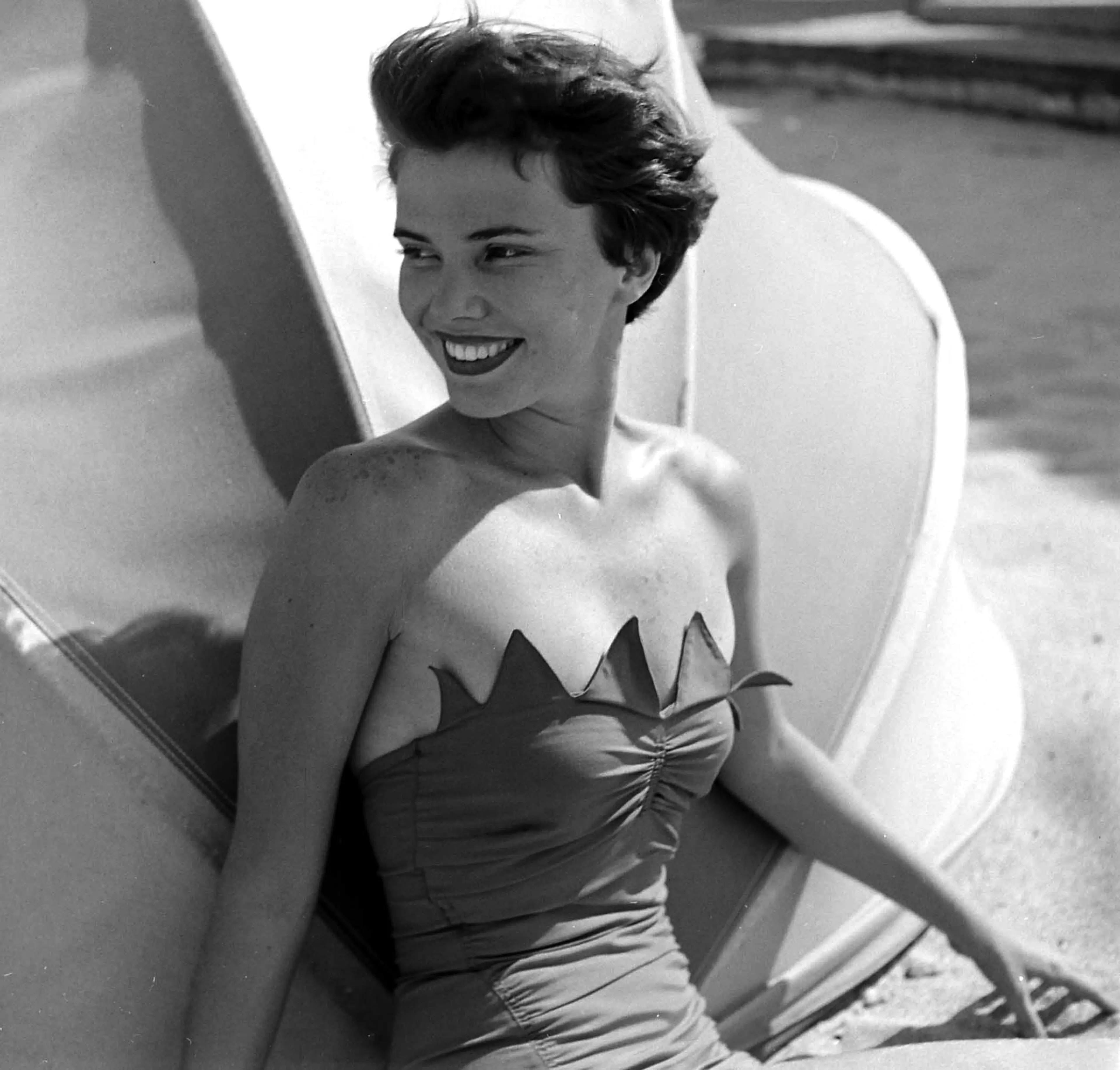 50s beach dress An Italian model wearing a striped beach dress. Italy, 1959