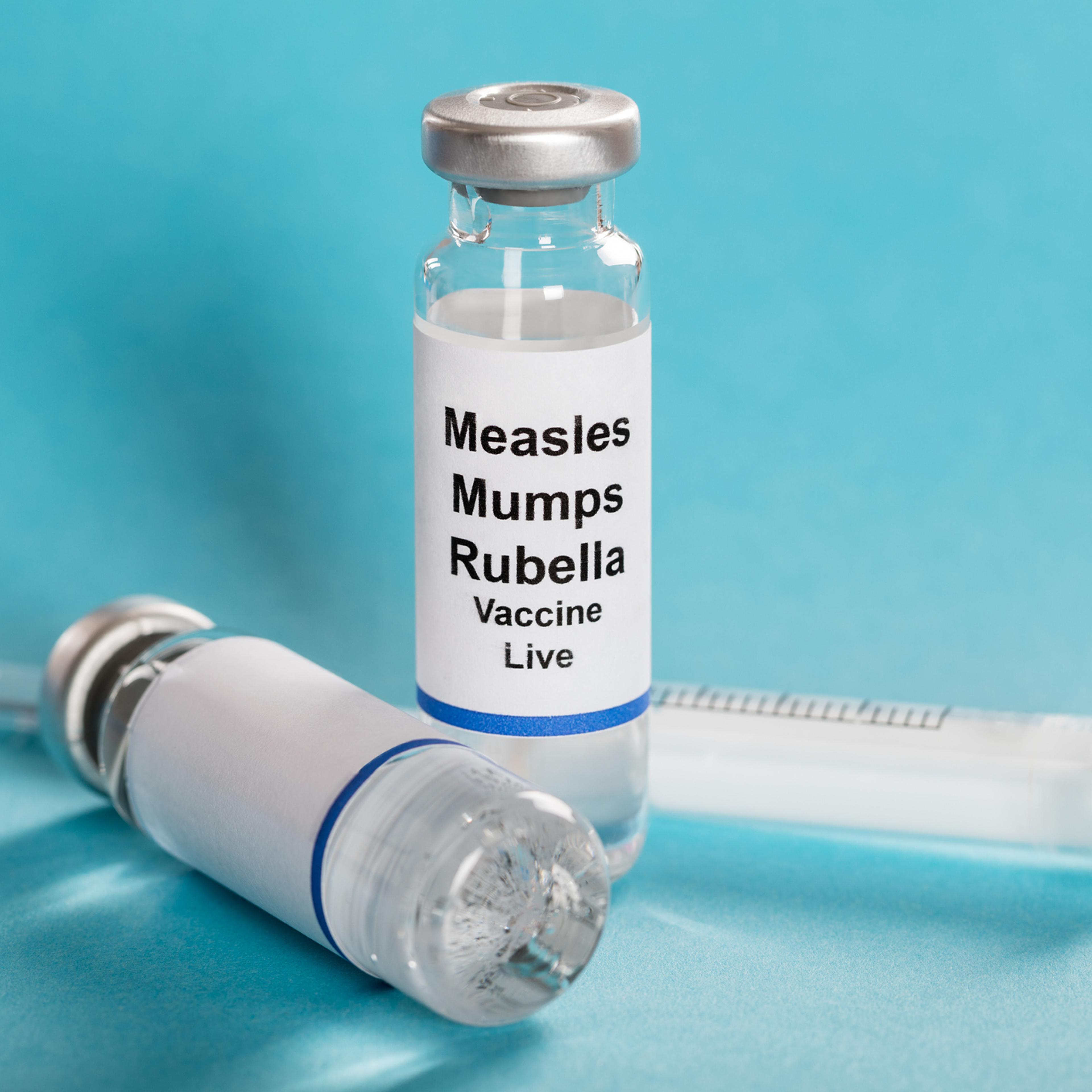 Measles Mumps Rubella Vaccine Vials With Syringe