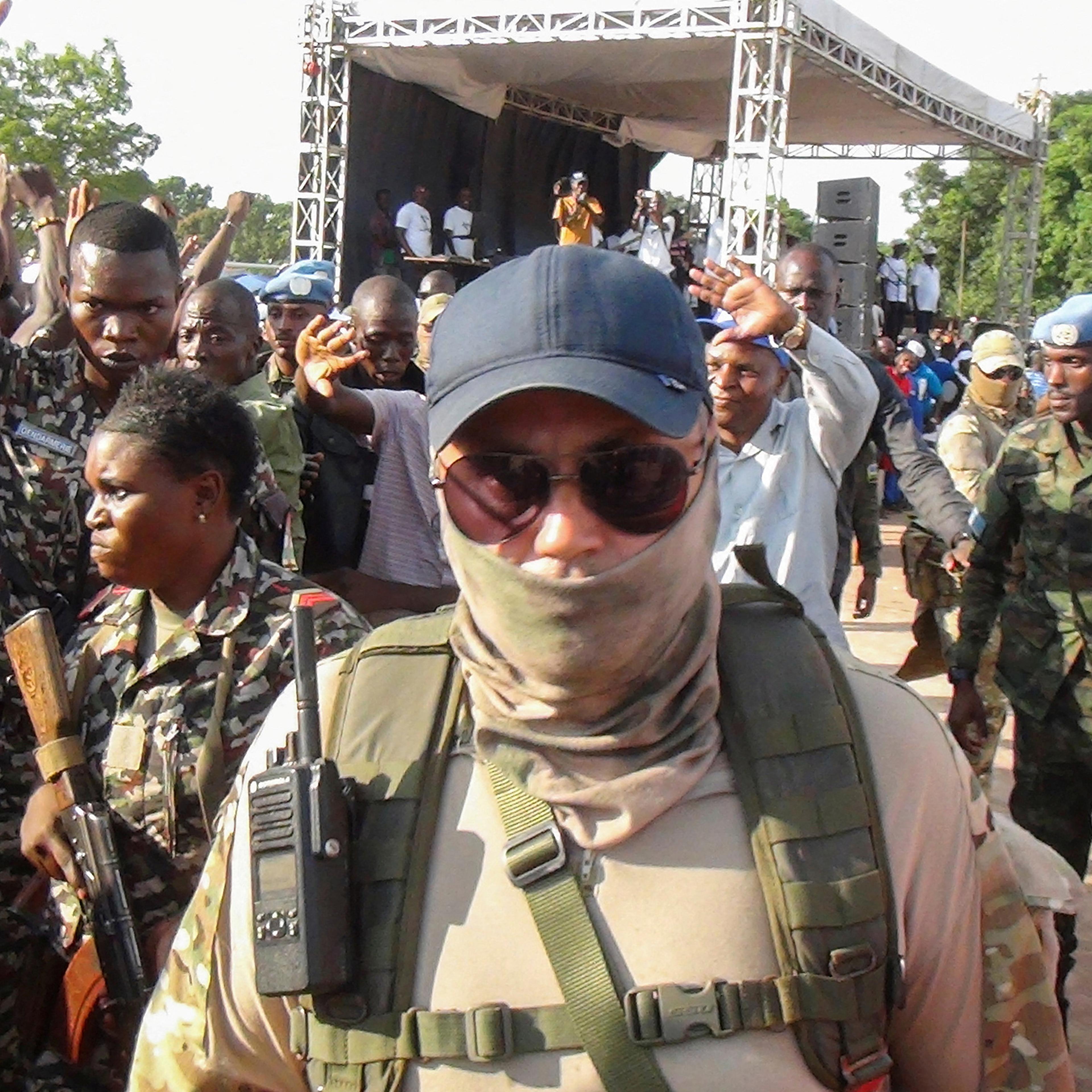 Russian officers from the Wagner Group are seen around Central African president Faustin-Archange Touadera as they are part of the presidential security system during the referendum campaign to change the constitution and remove term limits, in Bangui, C