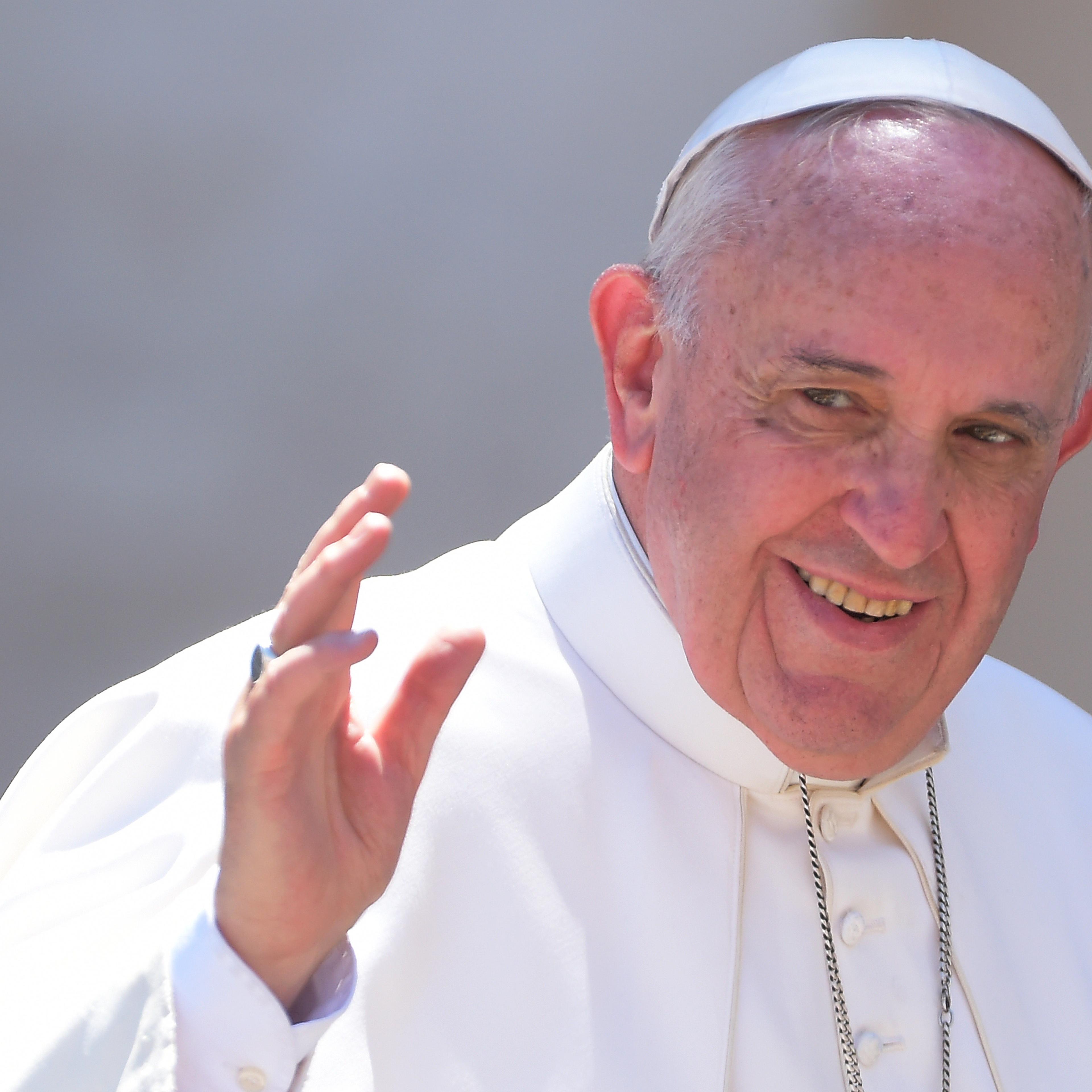 Pope Francis attends the weekly general audience in Saint Peter's square at the Vatican on April 22, 2015.