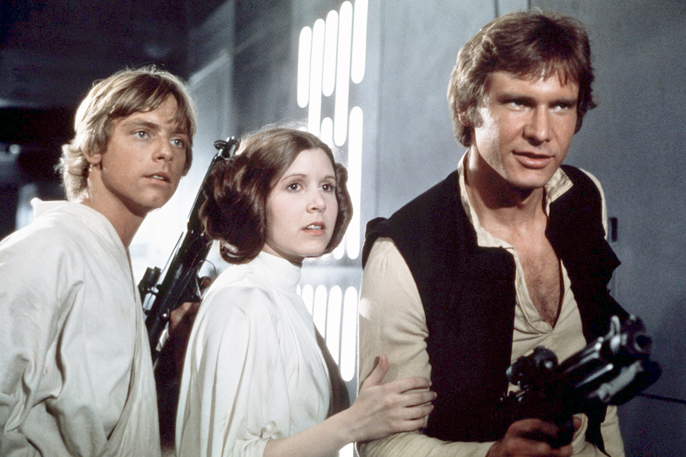 American actors Mark Hamill, Carrie Fisher and Harrison Ford on the set of Star Wars: Episode IV - A New Hope.