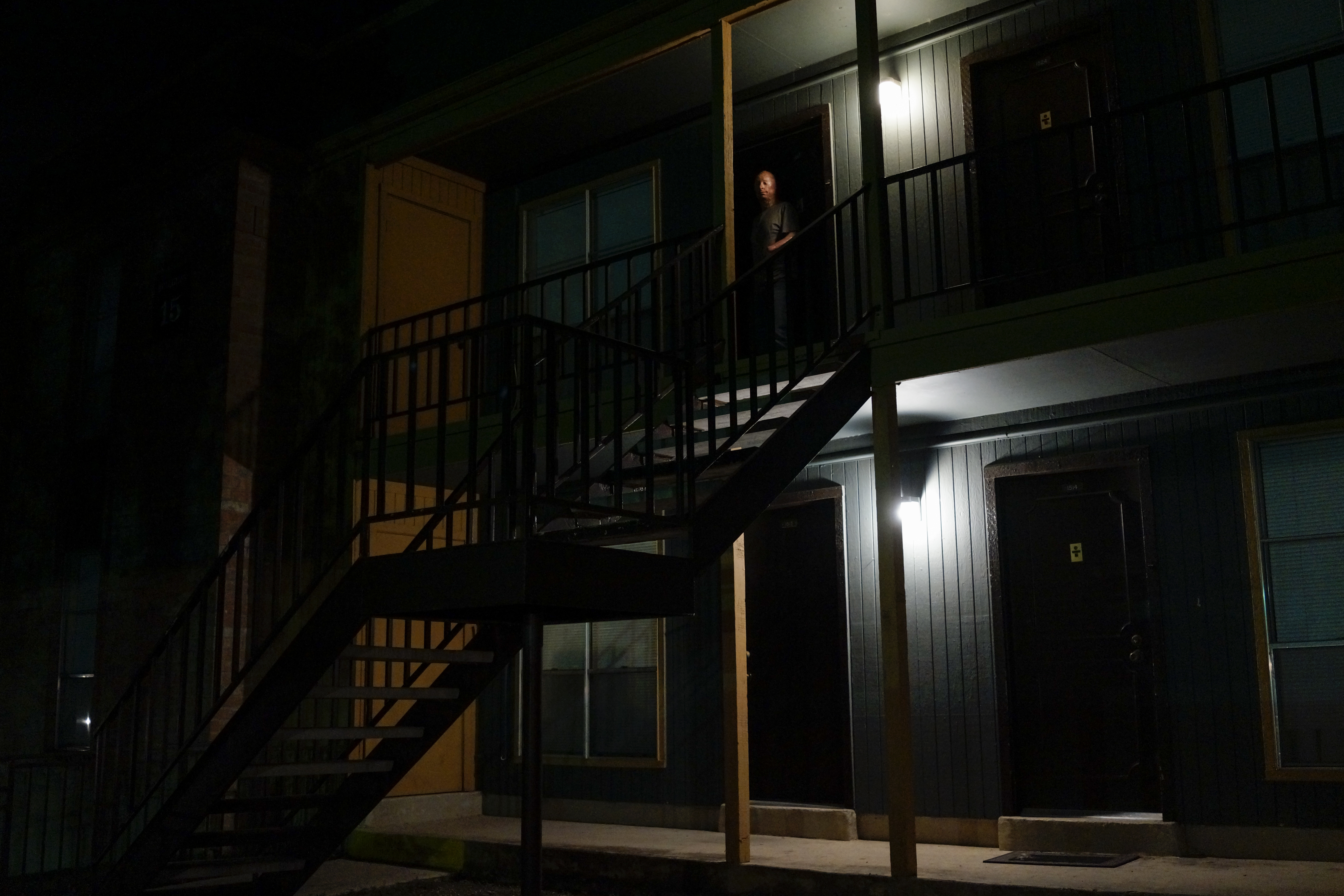 2013. San Antonio, TX. USA. Bobby at the door to his apartment after his weekly comedy gig at the Bracken Saloon. Bobby Henline, 41, veteran of four tours to Iraq and sole survivor of an IED blast that killed the other four soldiers in his humvee in Iraq
