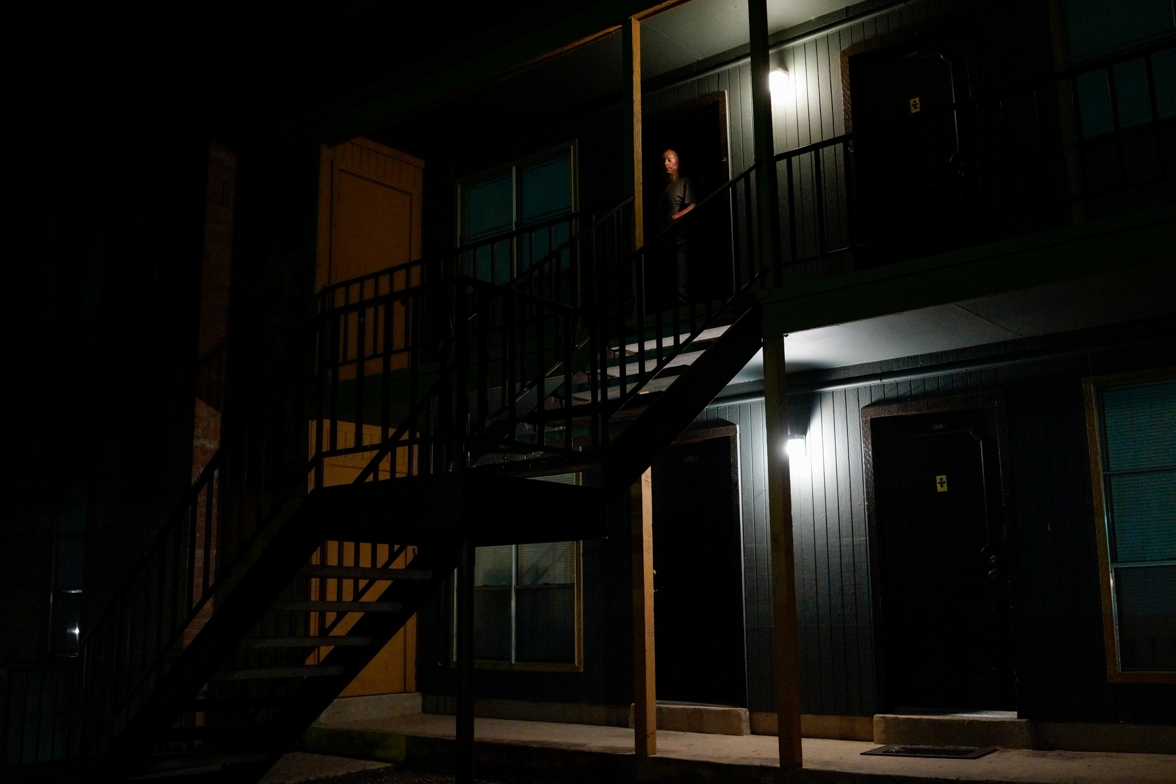 2013. San Antonio, TX. USA. Bobby at the door to his apartment after his weekly comedy gig at the Bracken Saloon. Bobby Henline, 41, veteran of four tours to Iraq and sole survivor of an IED blast that killed the other four soldiers in his humvee in Iraq