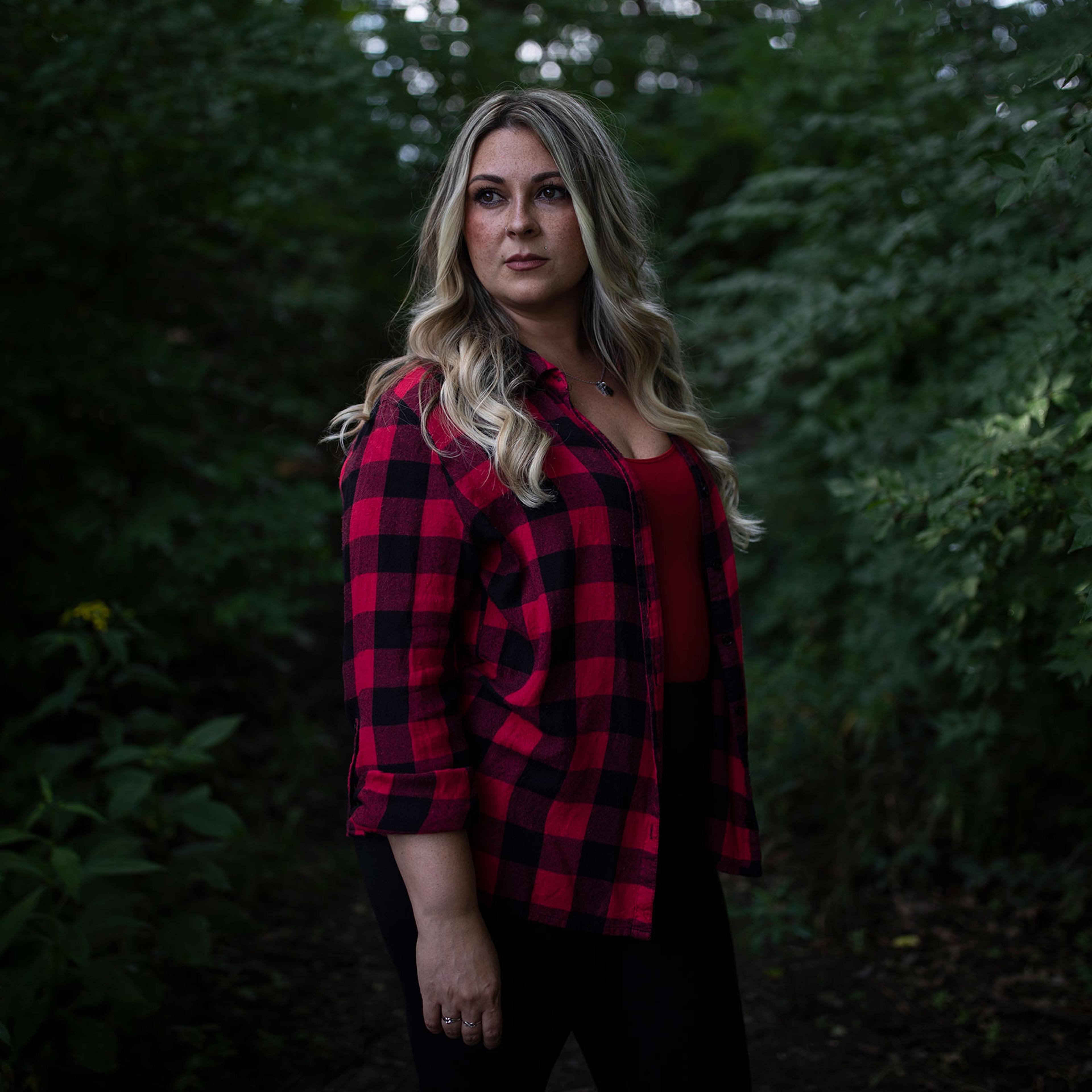 Tara George stands in Coe Lake Park near her home in Berea, OH on August 22, 2022. Tara had a wanted pregnancy and found out at 20 weeks that the fetus had multiple lethal anomalies, which would also have put her own life in danger even if she tried to d