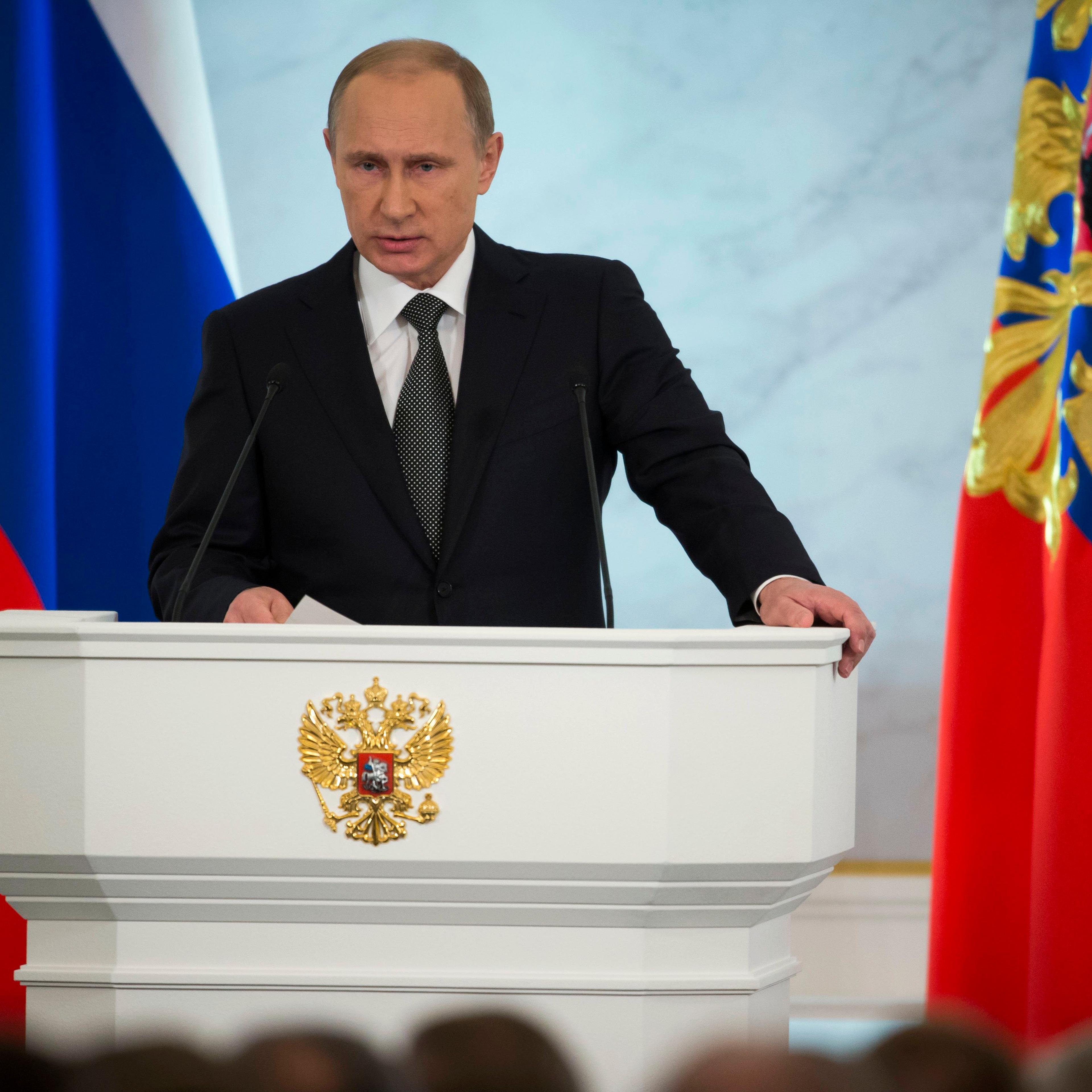 Russian President Vladimir Putin gives his annual state of the nation address in the Kremlin in Moscow on Dec. 4, 2014.