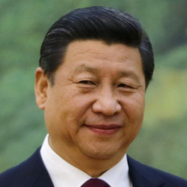 China's President Xi attends a meeting with former U.S. President Clinton at the Great Hall of the People, in Beijing