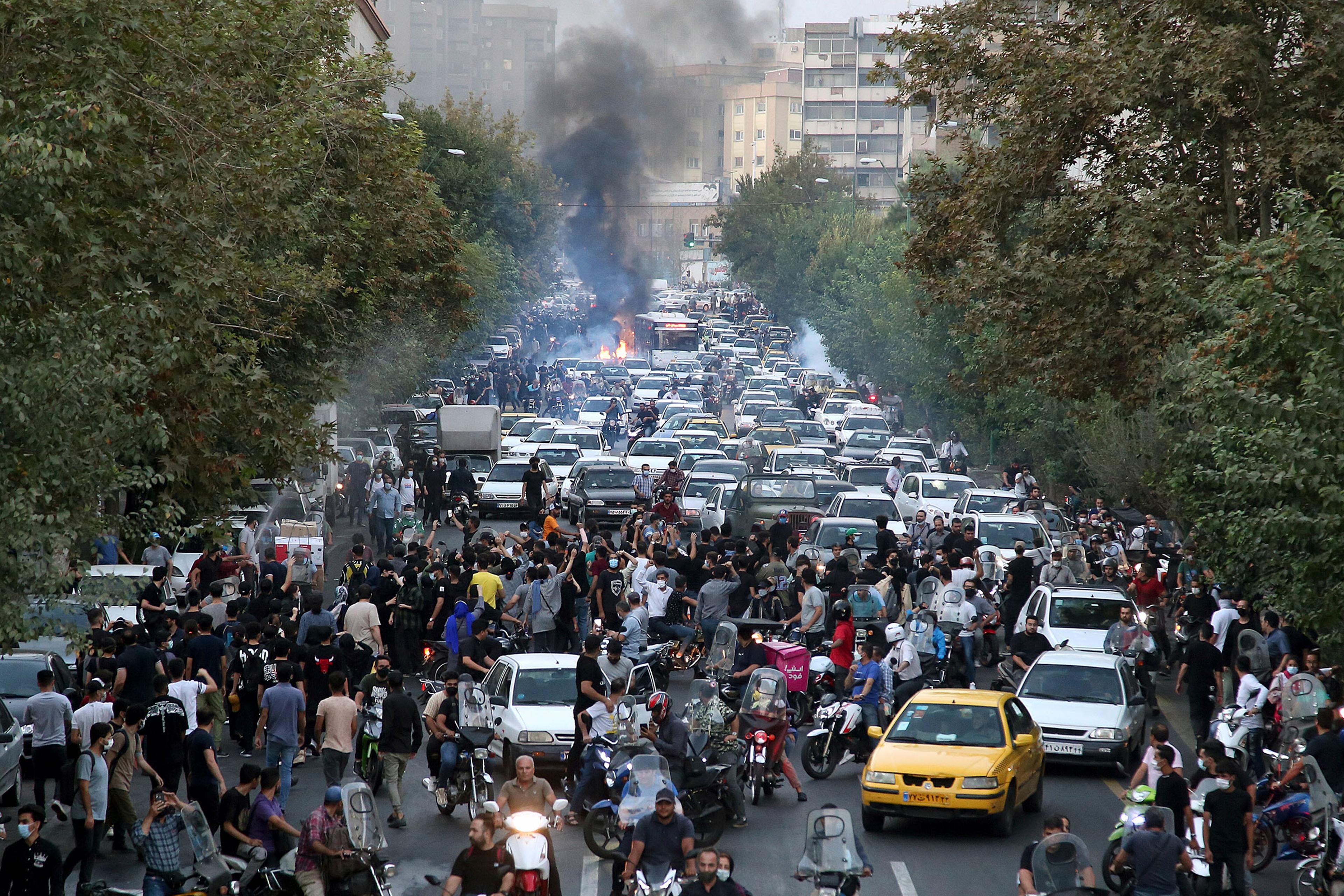 Protesters gather in the streets of Tehran over the death of Mahsa Amini, Sept. 21, 2022.