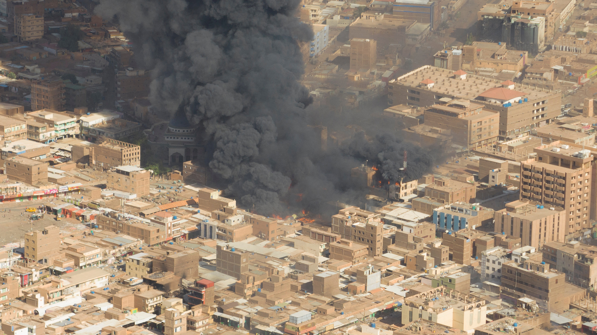 Black smoke and fire at Omdurman market in Omdurman, Sudan, May 15.
