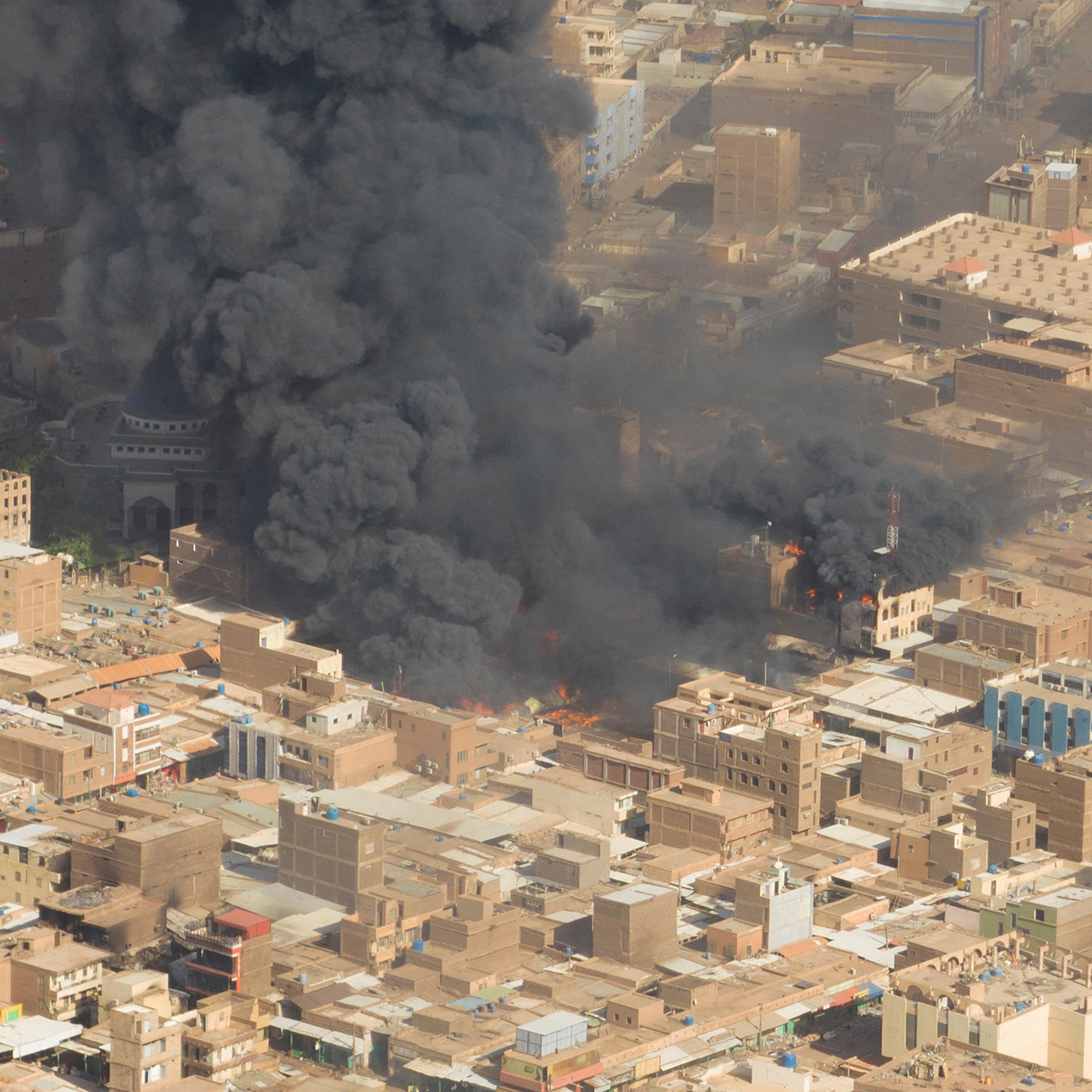 Black smoke and fire at Omdurman market in Omdurman, Sudan, May 15.