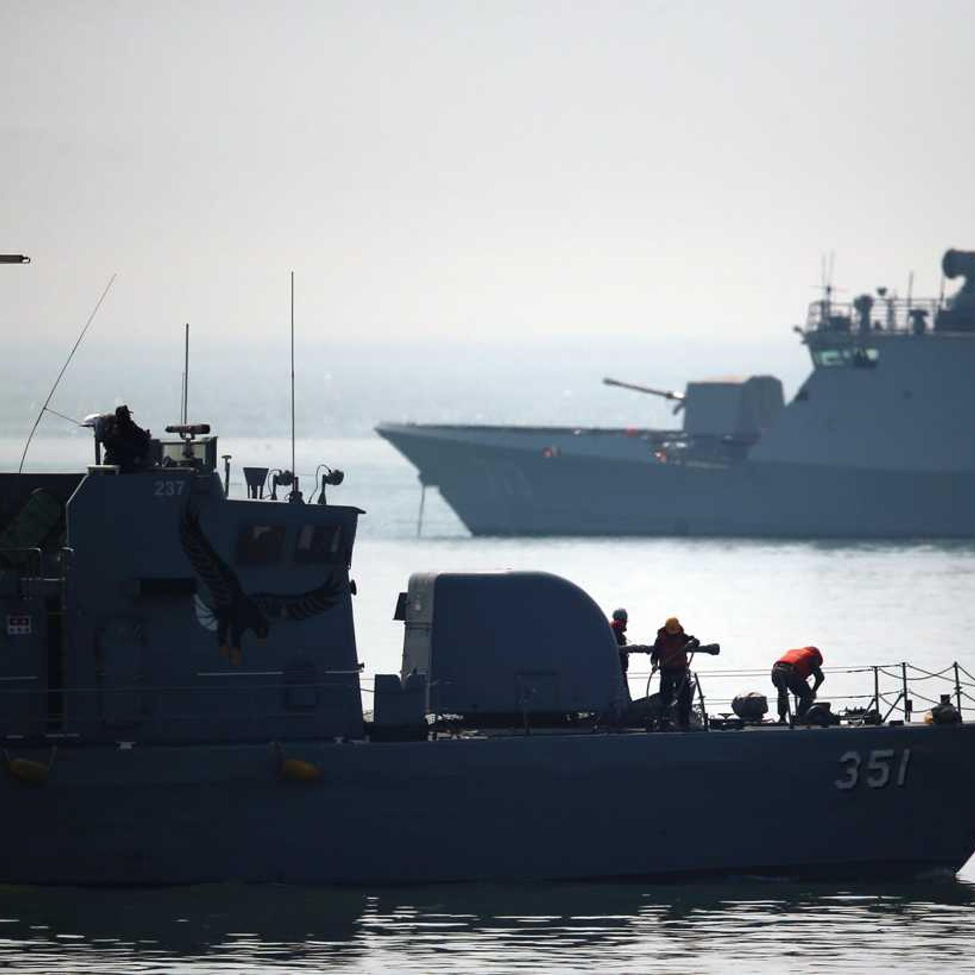 South Korean navy warships patrol around Daecheong island near the West Sea border with North Korea, Tuesday, April 1, 2014.