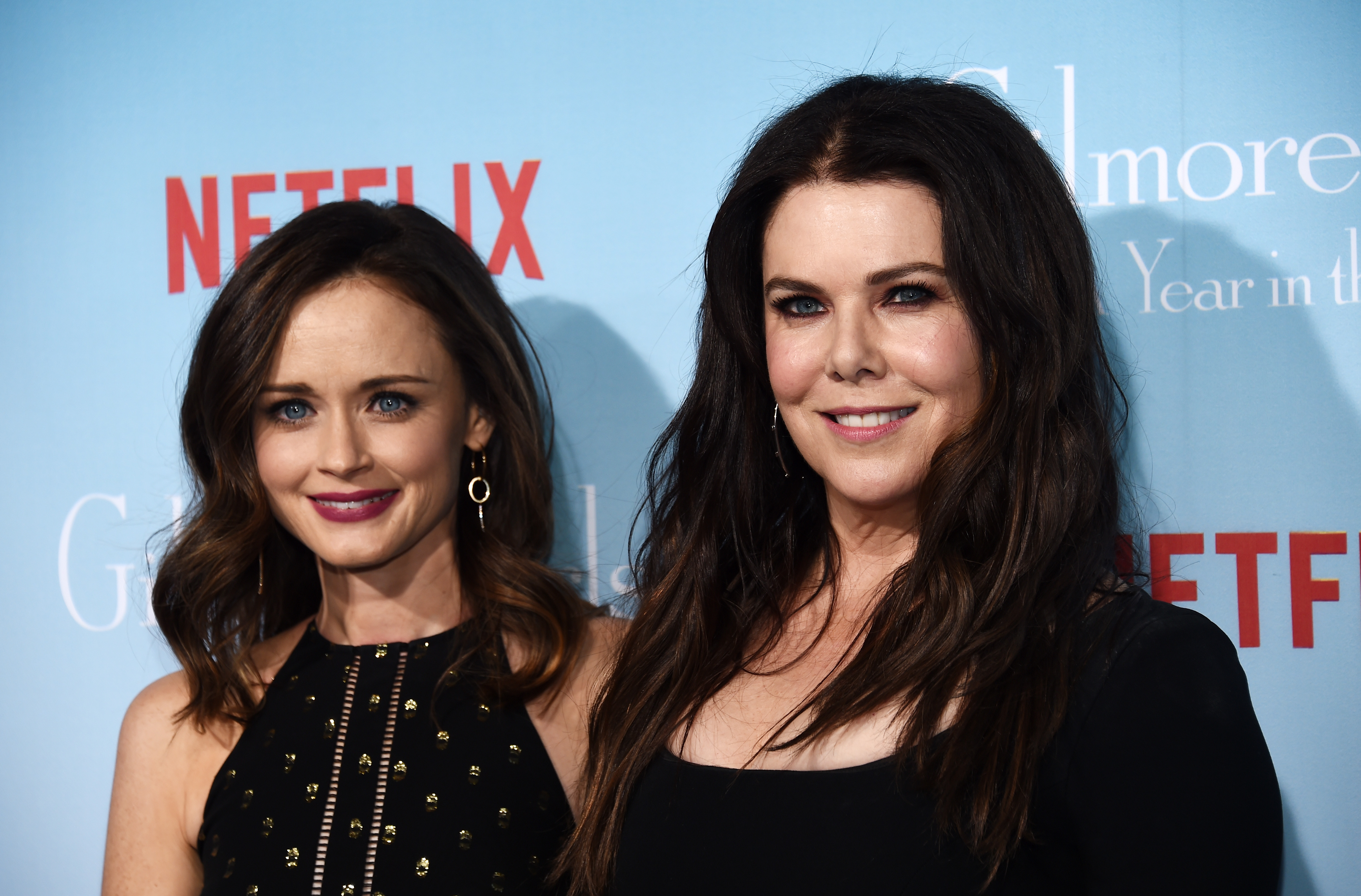 Actresses Alexis Bledel (L) and Lauren Graham arrive at the premiere of Netflix's "Gilmore Girls: A Year In The Life" at the Regency Bruin Theatre on November 18, 2016 in Los Angeles, California.