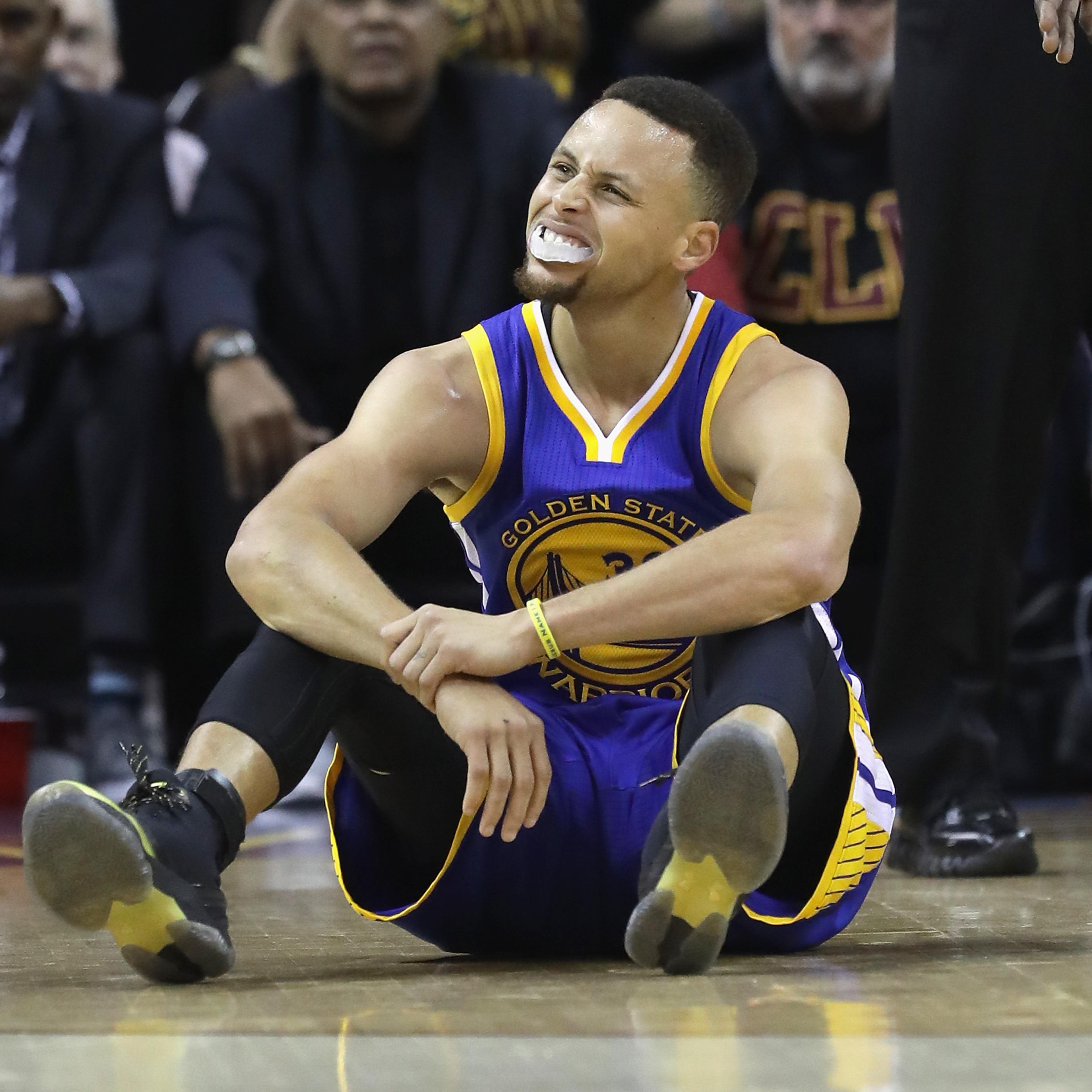 Stephen Curry of the Golden State Warriors reacts after a call in the first half against the Cleveland Cavaliers in Game 6 of the 2016 NBA Finals at Quicken Loans Arena on June 16, 2016 in Cleveland, Ohio.