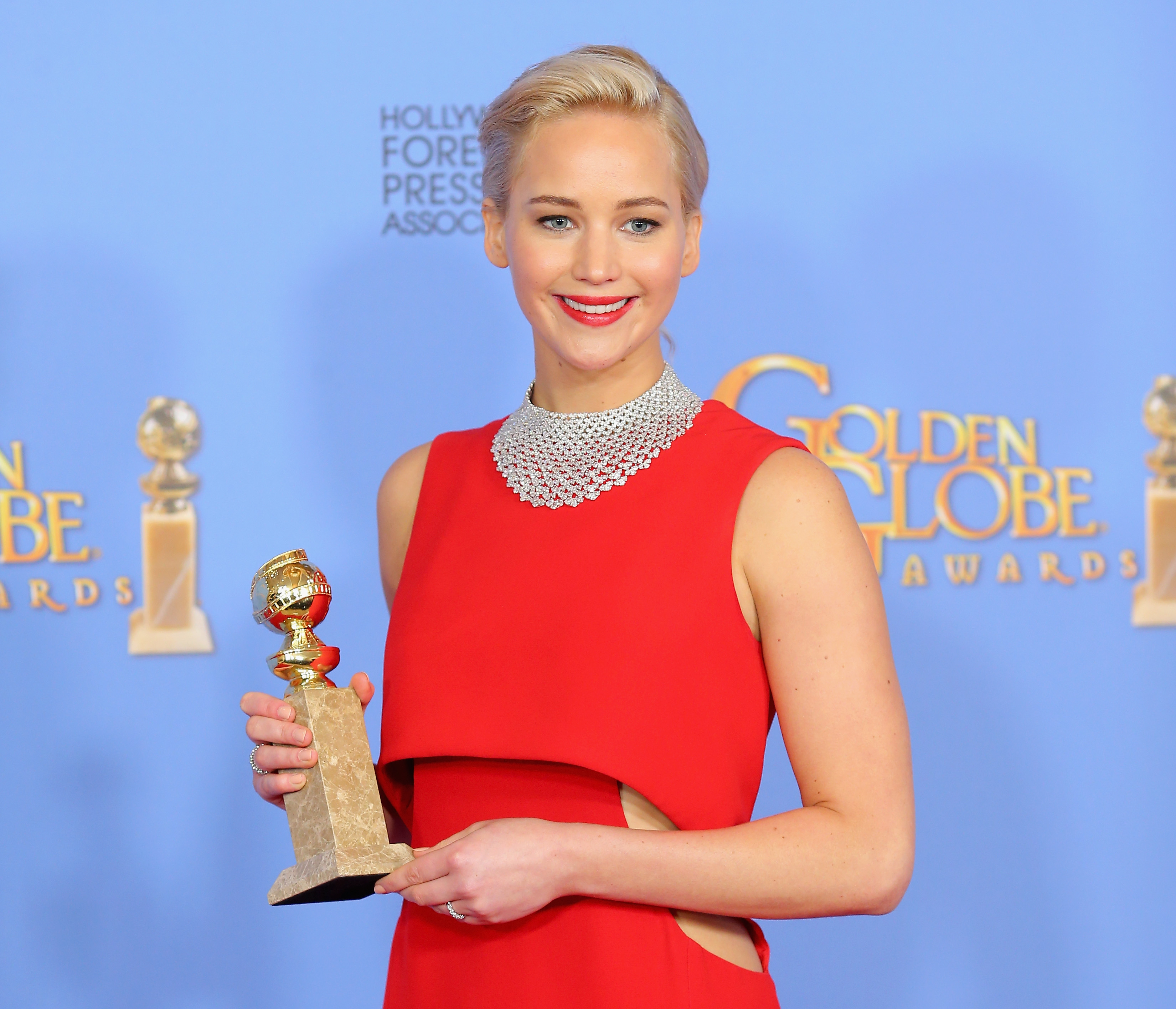 jennifer lawrence passengers red dress The Hidden Meaning Behind the Bleeding Heart on Jennifer Lawrence's  Passengers Premiere Gown