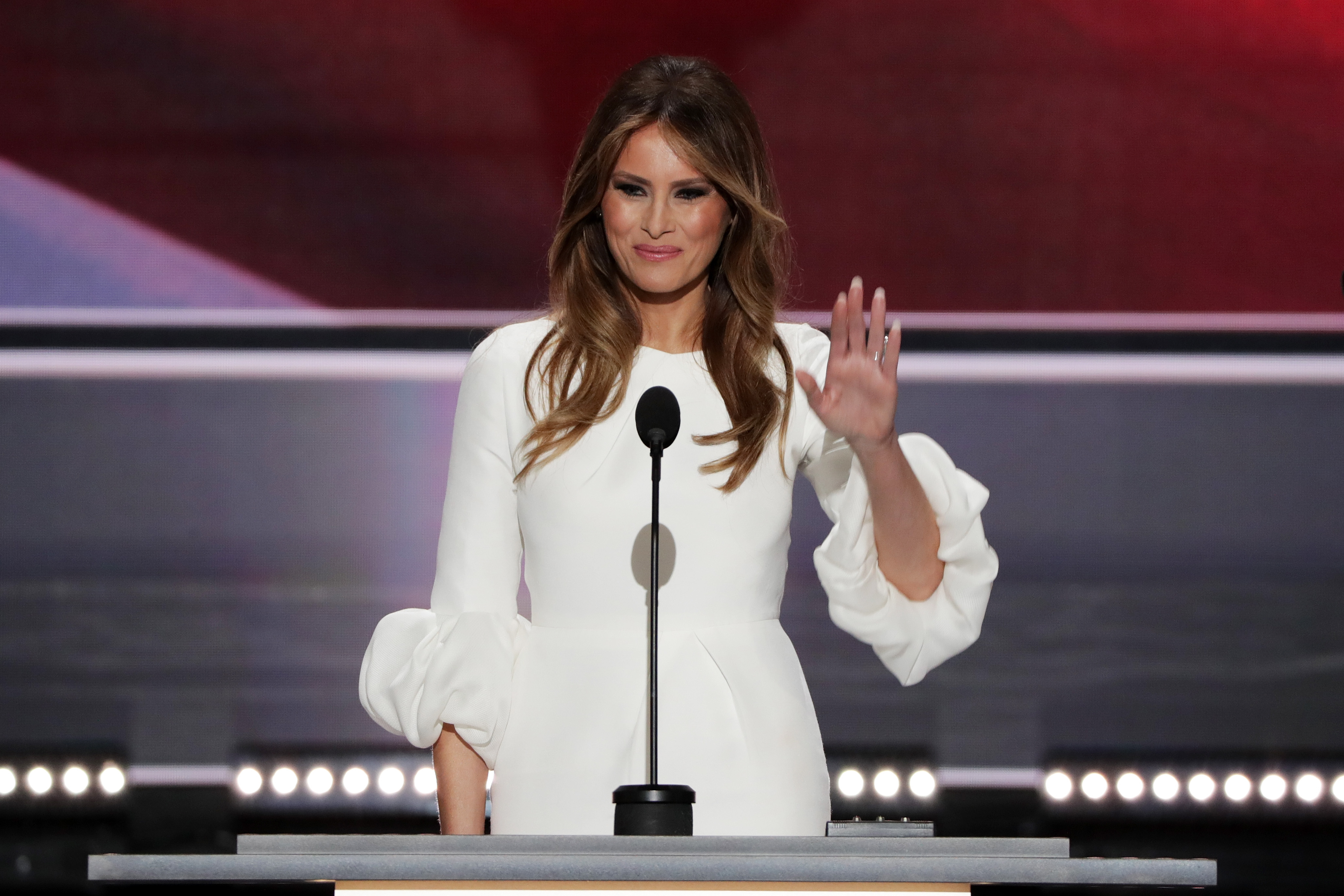 Melania Trump, wife of Presumptive Republican presidential nominee Donald Trump, waves to the crowd after delivering a speech on the first day of the Republican National Convention at the Quicken Loans Arena in Cleveland on July 18, 2016.
