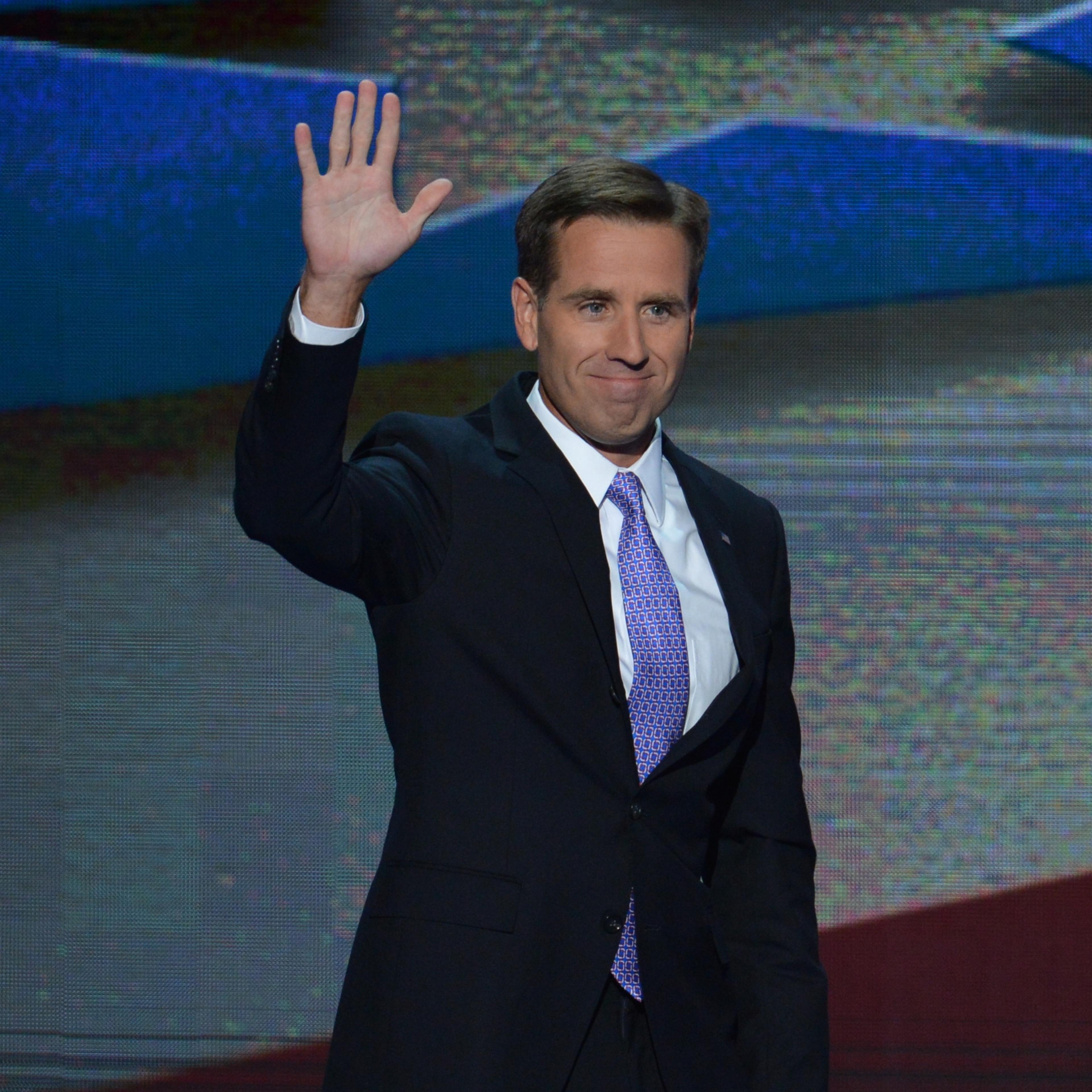 Attorney General of Delaware and son of Vice President Joe Biden, Beau Biden, waves to the audience at the Time Warner Cable Arena in Charlotte, North Carolina, on September 6, 2012 on the final day of the Democratic National Convention.
