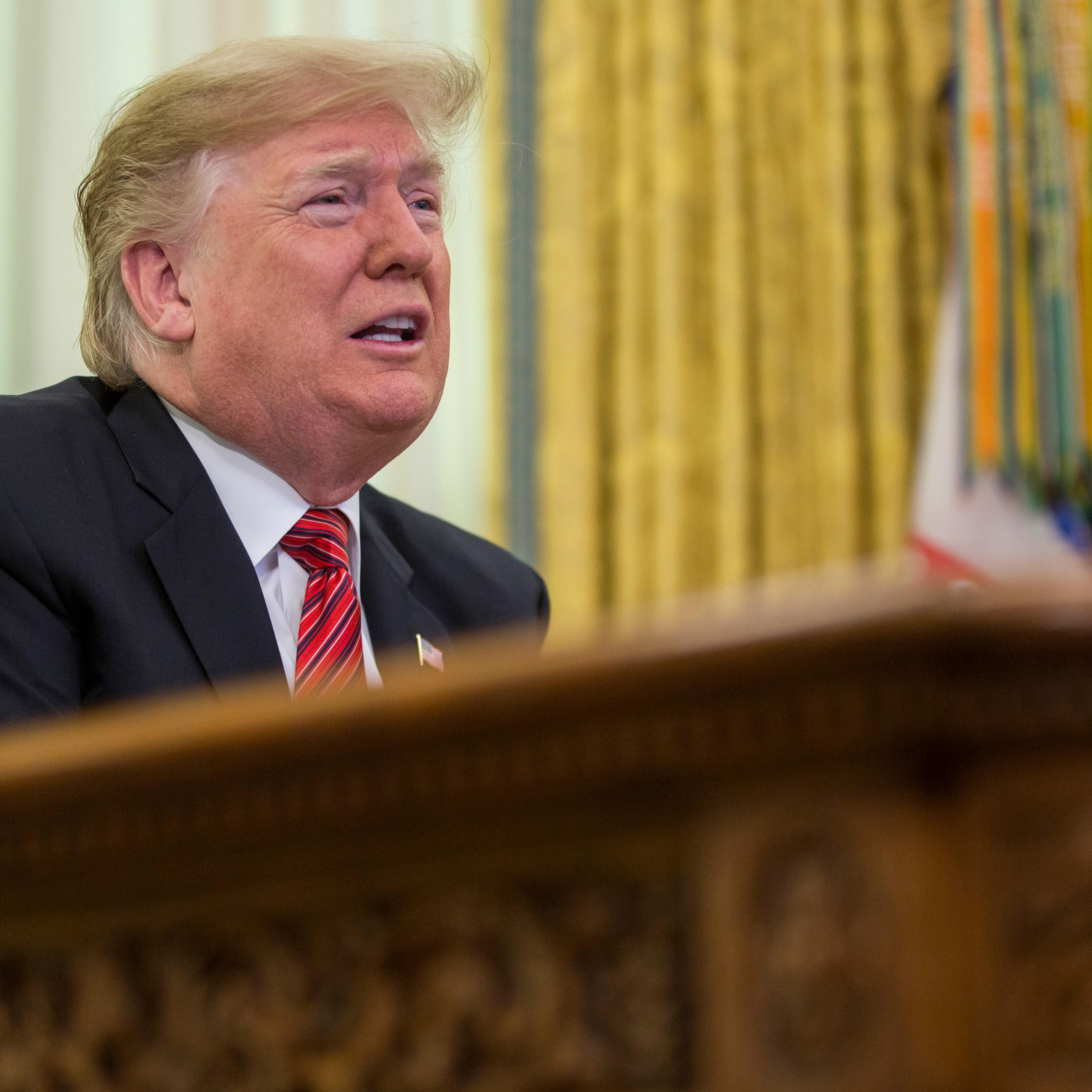 Trump Delivers Christmas Day Message To Troops From Oval Office